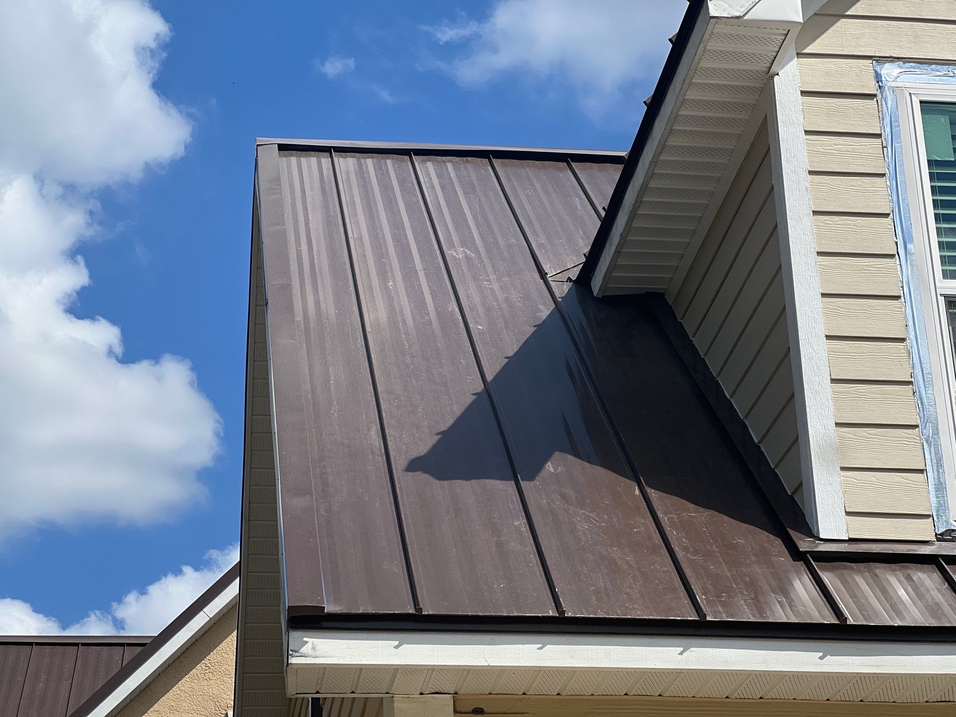 Charcoal Brown Standing Seam by Reimagine Roofing