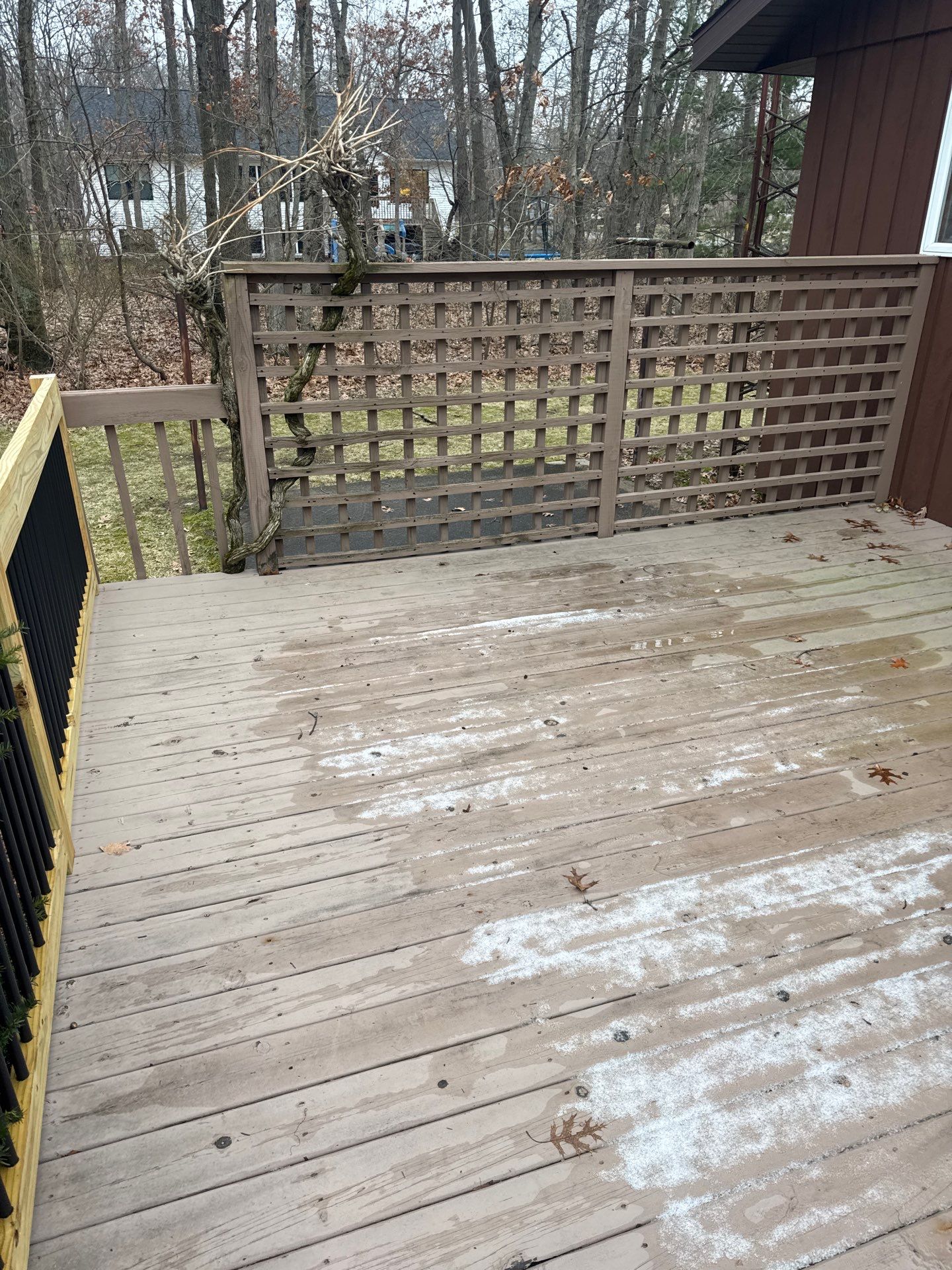 Muskegon Deck Restoration with Pressure Treated Railings and Wood Staining by Gordon Painting