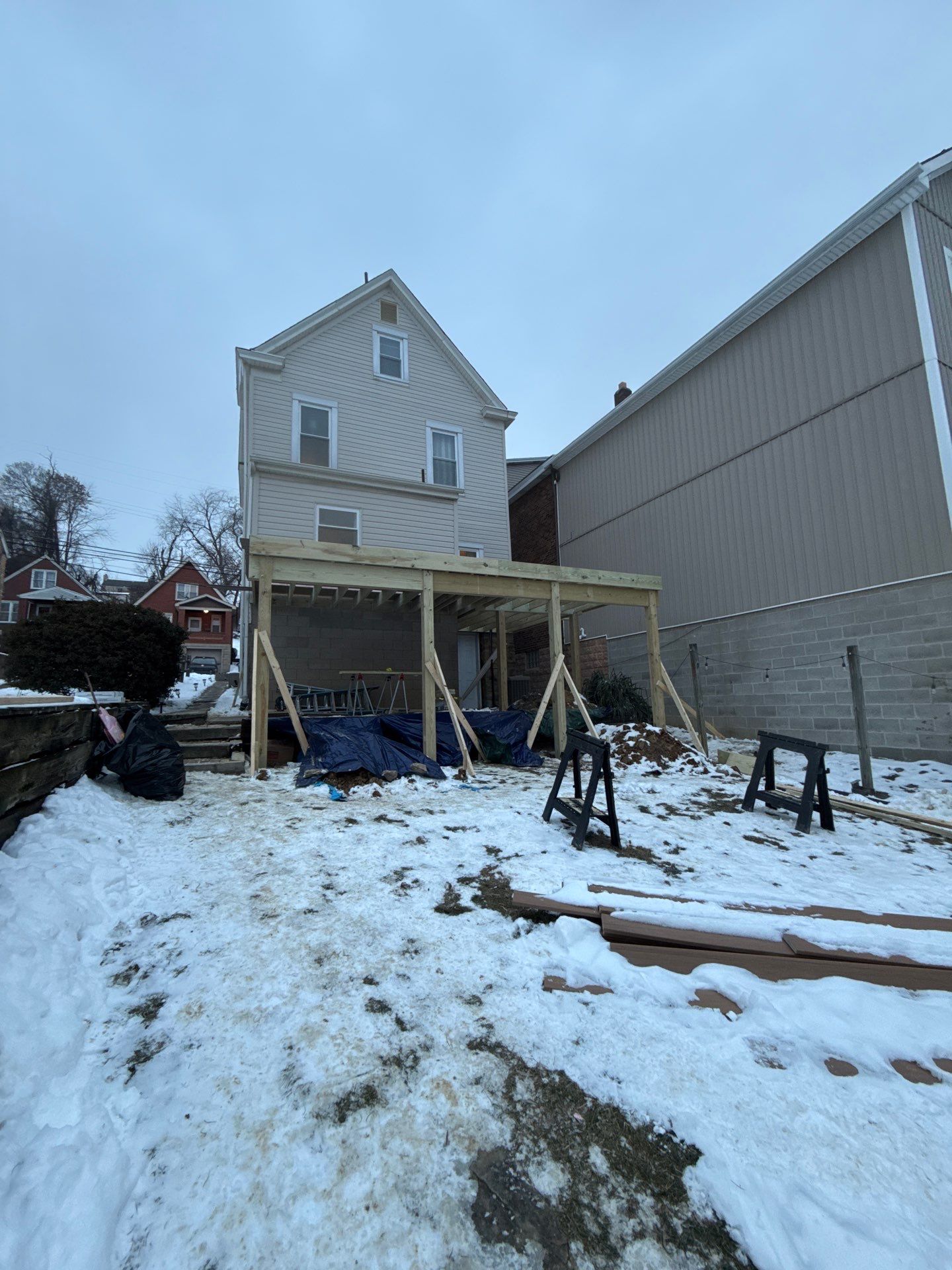 Deck and door by Cousins Roofing Siding & Decks