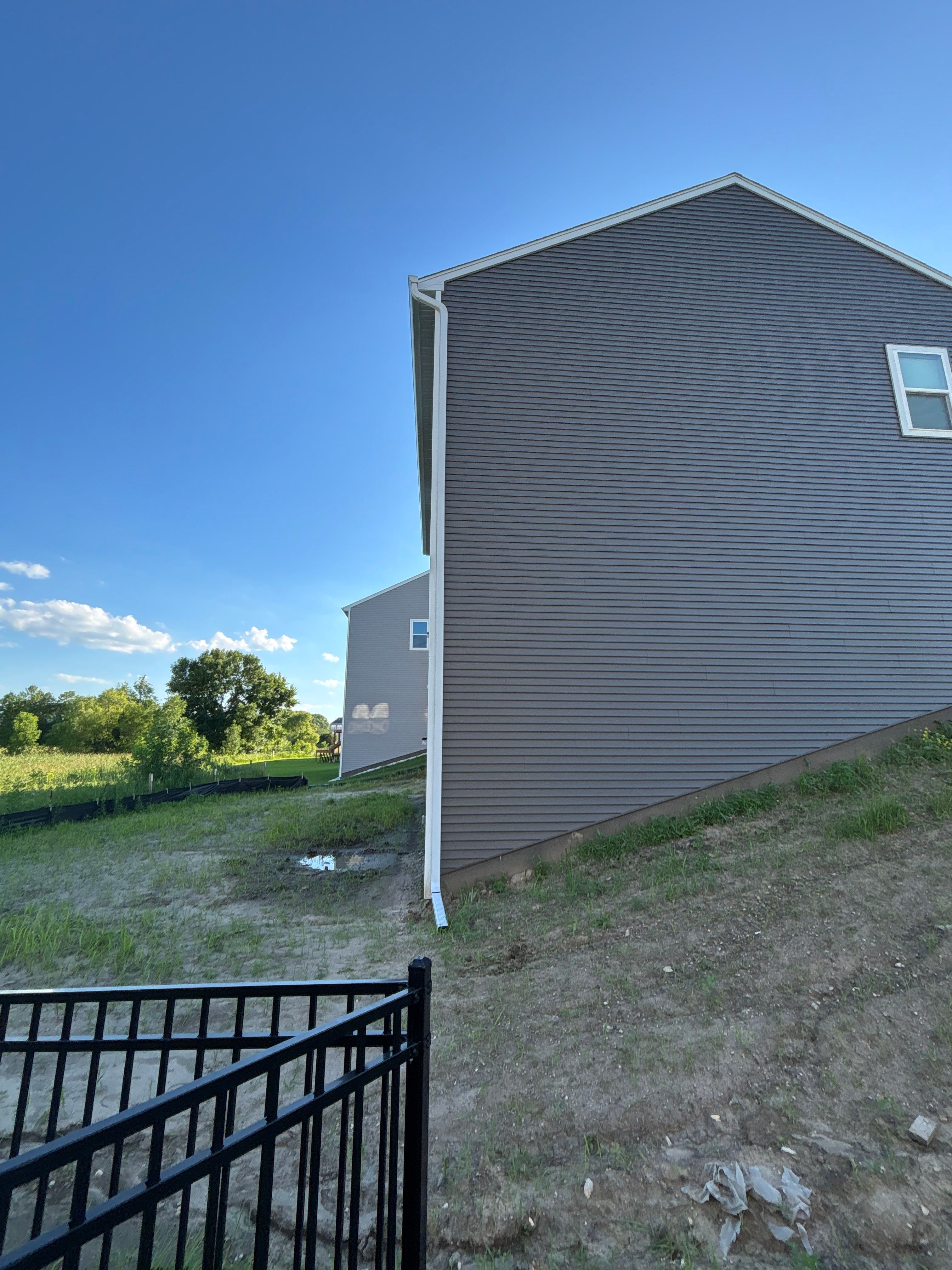 6" Seamless Gutters on 3-Story Home – Rogers, MN by Next Level Seamless Gutters / Exteriors Inc.