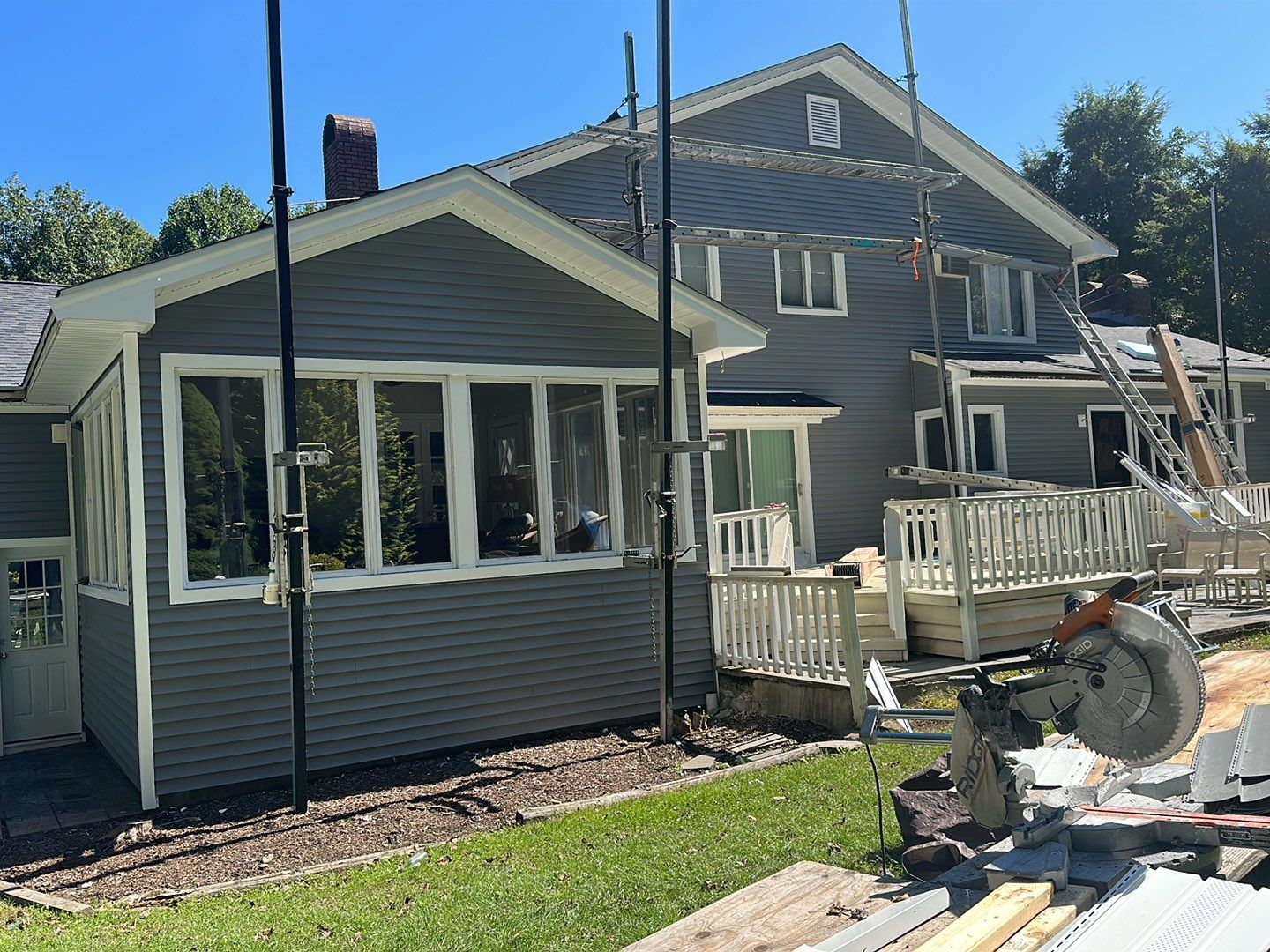 Residential Roofing Installation using Owens Corning TruDefinition Duration AR - Onyx Black & New Siding Using Mainstreet Charcoal Gray by A Plus Exterior
