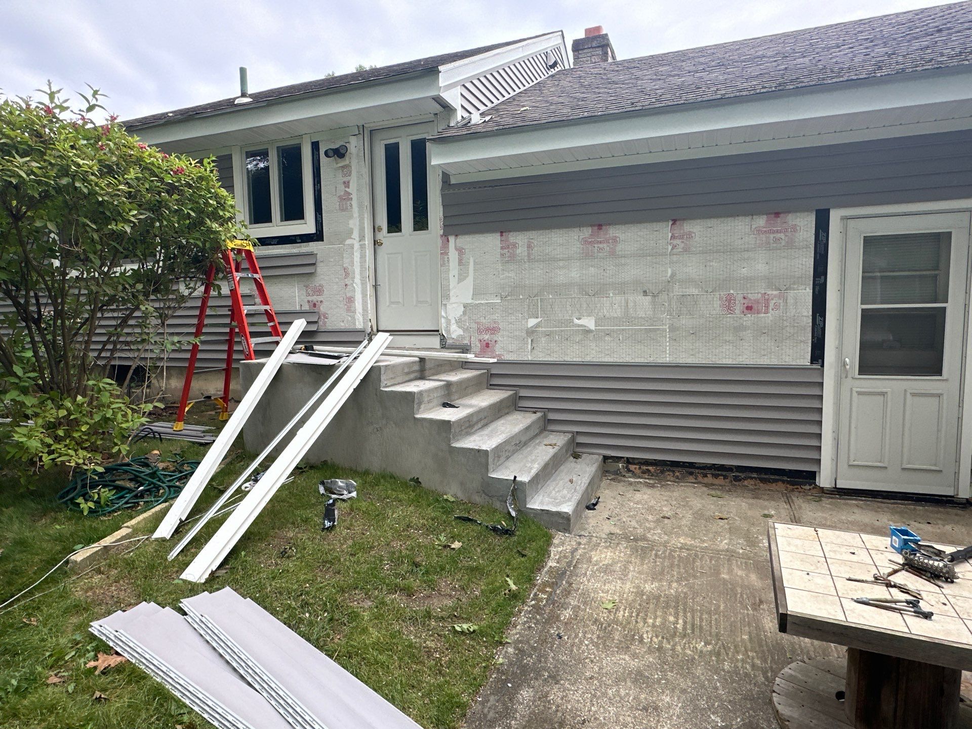 Siding Installation using CertainTeed Monogram Vinyl Siding - D4 - Granite Gray by A Plus Exterior