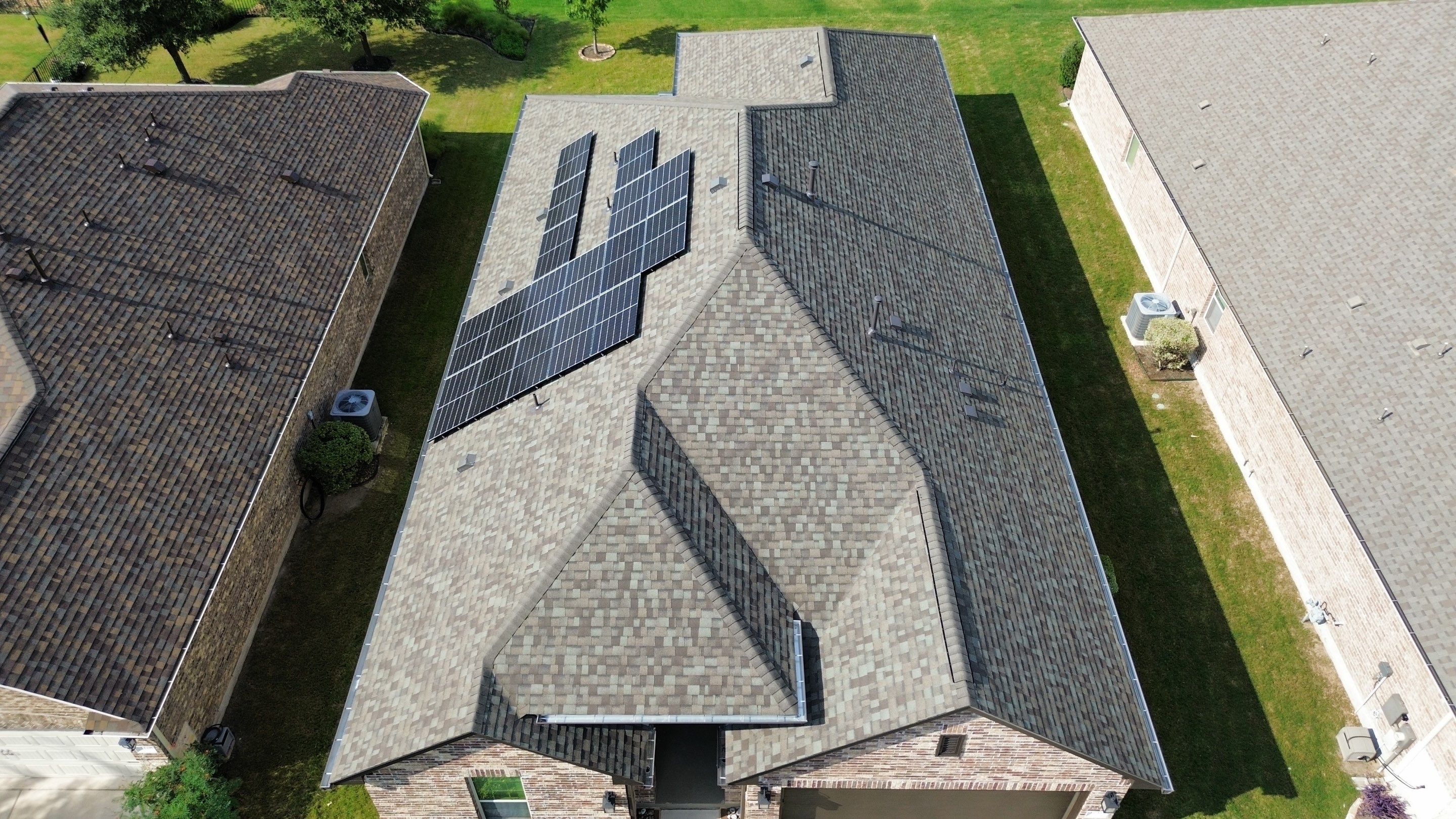 Full Roof Replacement with Solar Reinstall – Duration Driftwood | Round Rock, TX by Kstylez Roofing & Construction