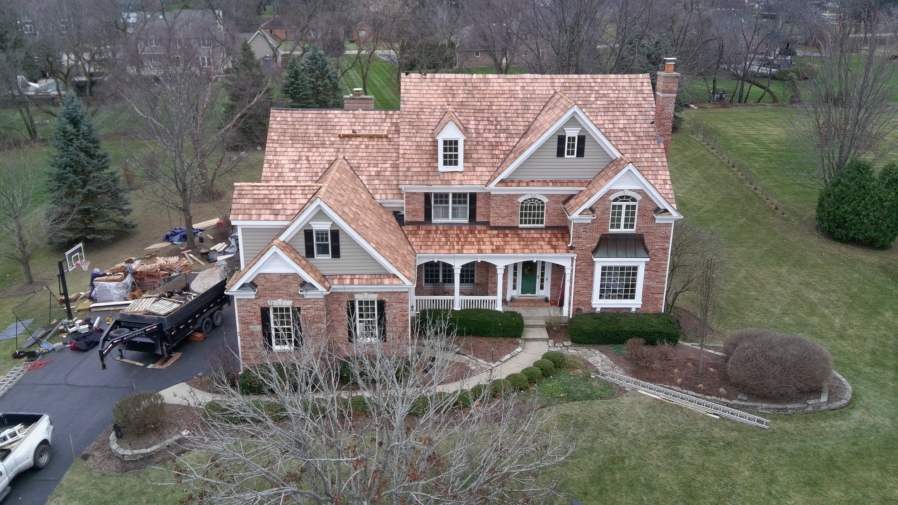Re-roof: Cedar Shake & Custom Copper by Midwest Building Solutions