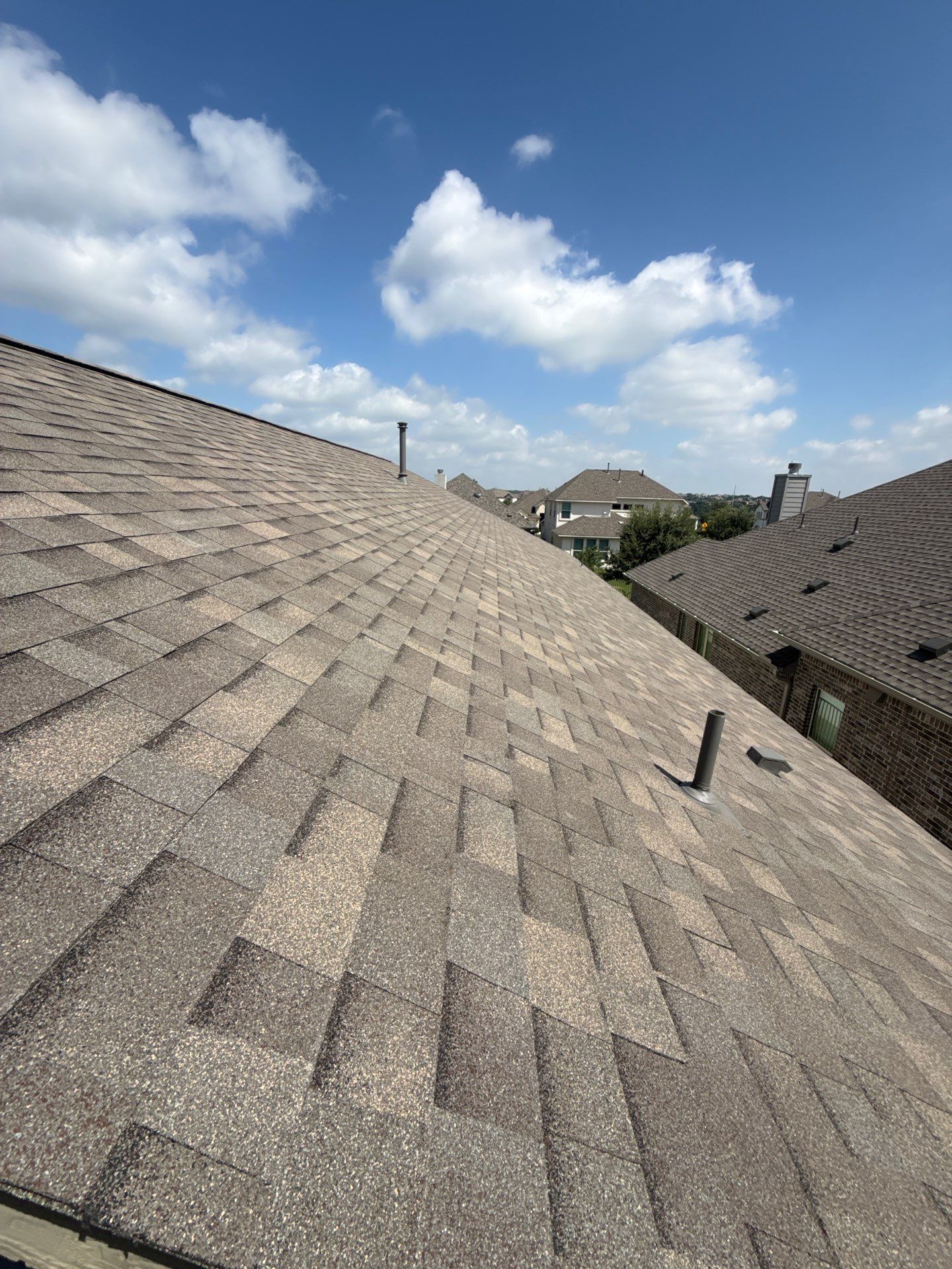 Residential Roof Replacement using Malarkey - Vista AR - Weathered Wood Plus by Action Exteriors Austin
