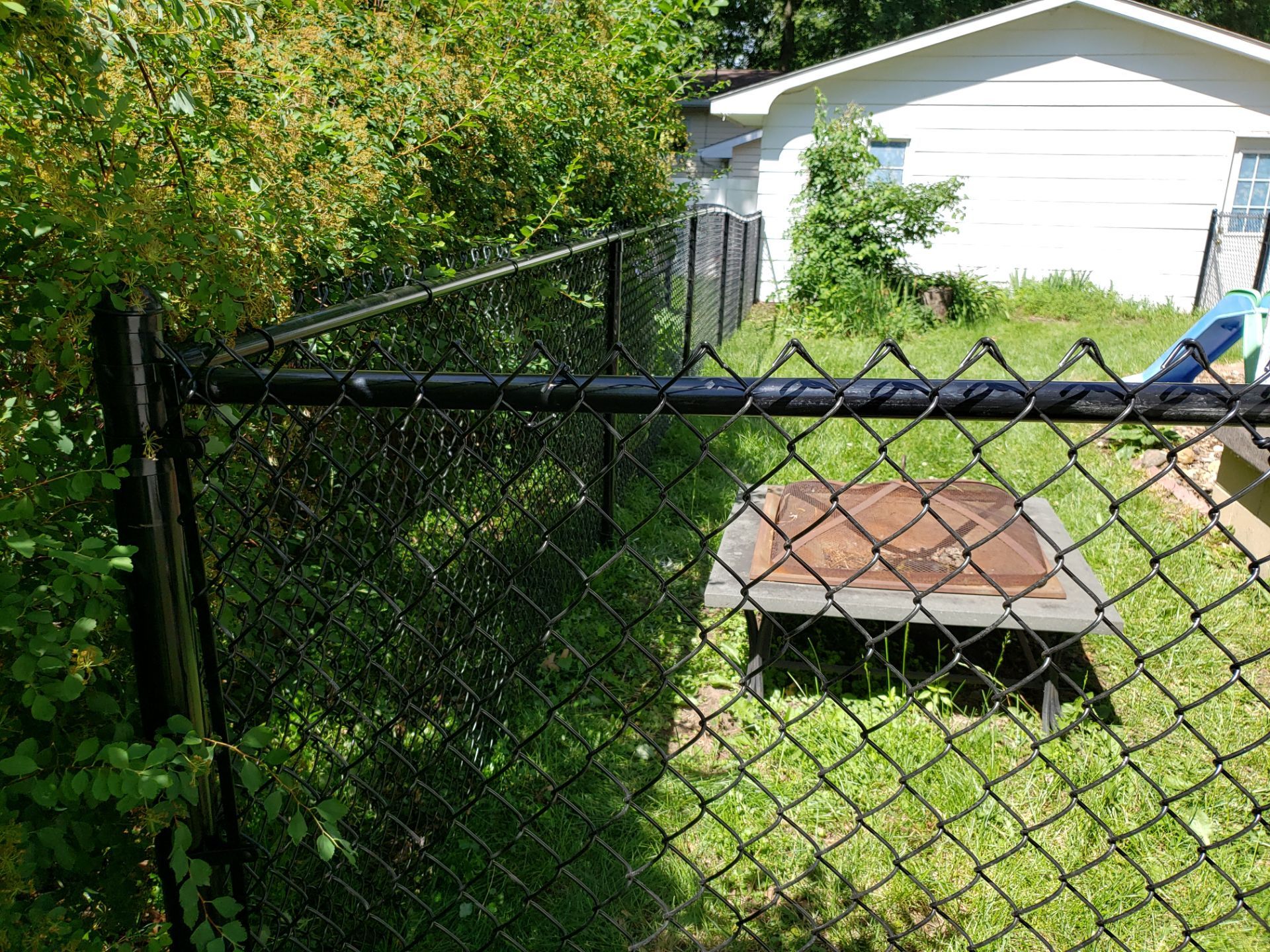 Black Chain Link Perimeter Fence and Gate Installation in Cedar Falls by Perfect Picket Fence and Stain