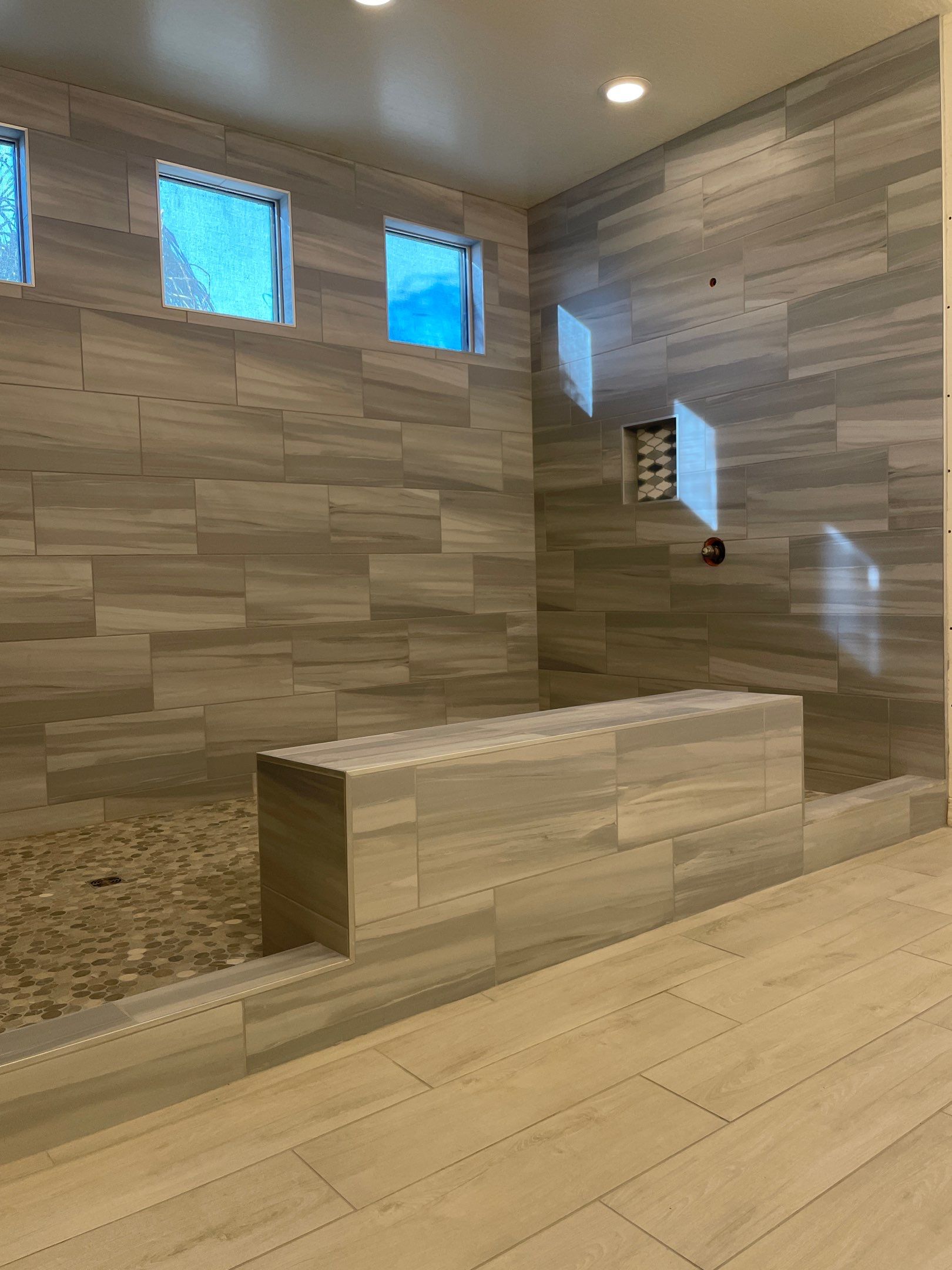 Wood Look Tile Floors and an Extra Large Shower  by Footprints Floors of Chandler 