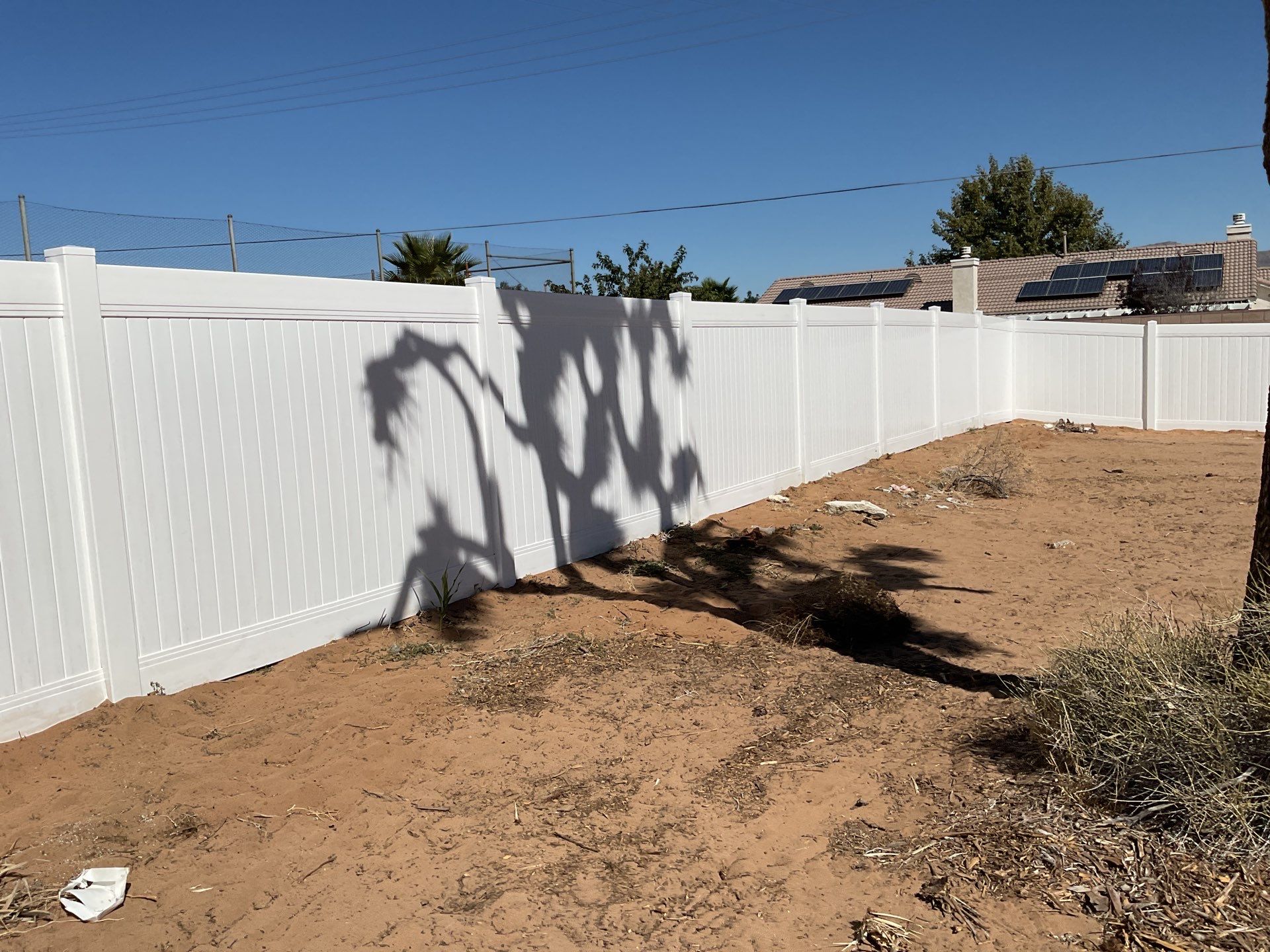 White picket fence  by Fence Guys Inc. 