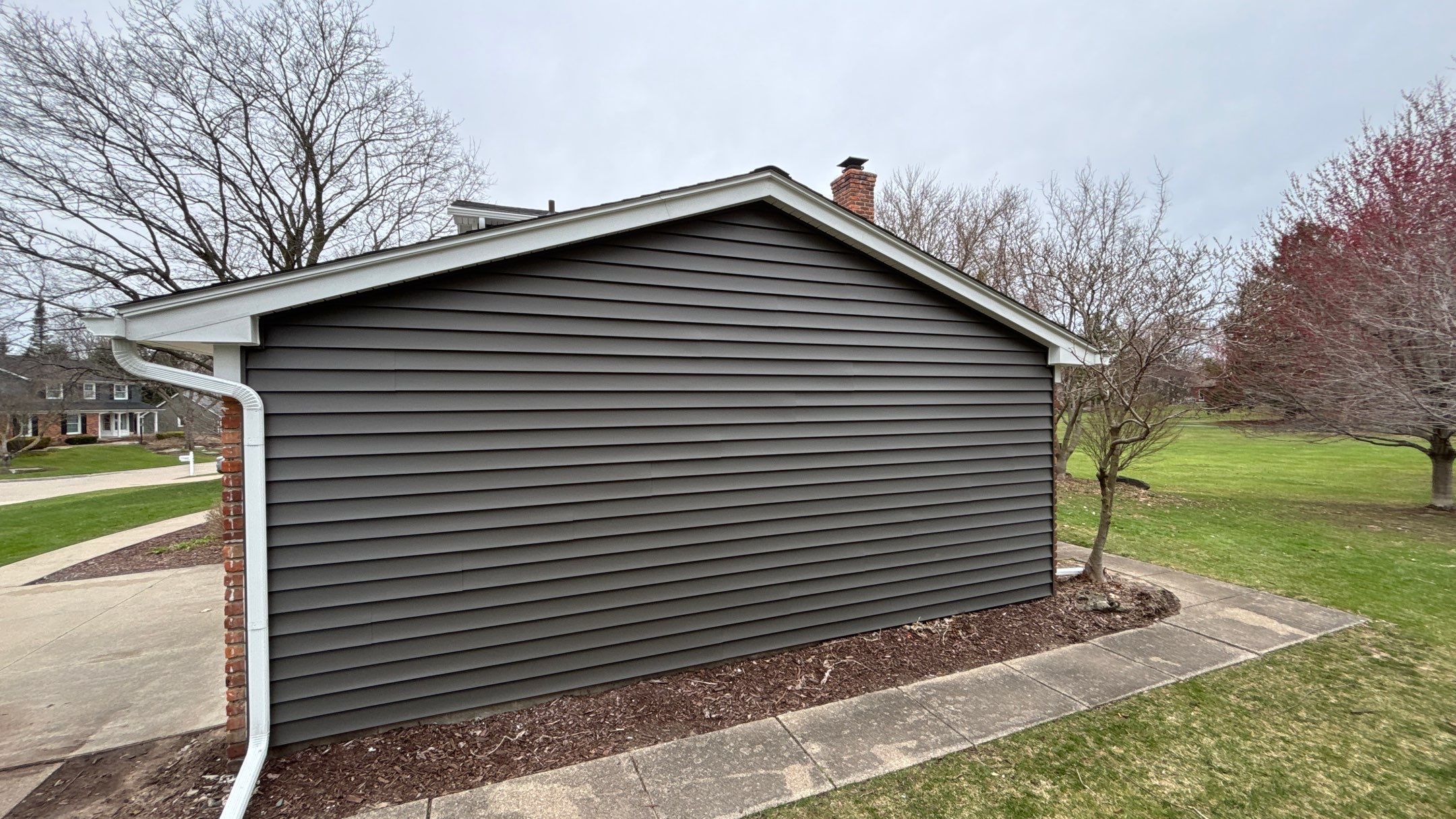 Siding Replacement using Alside Charcoal Smoke and Roof Replacement using Owens Corning Peppercorn by 180 Contractors