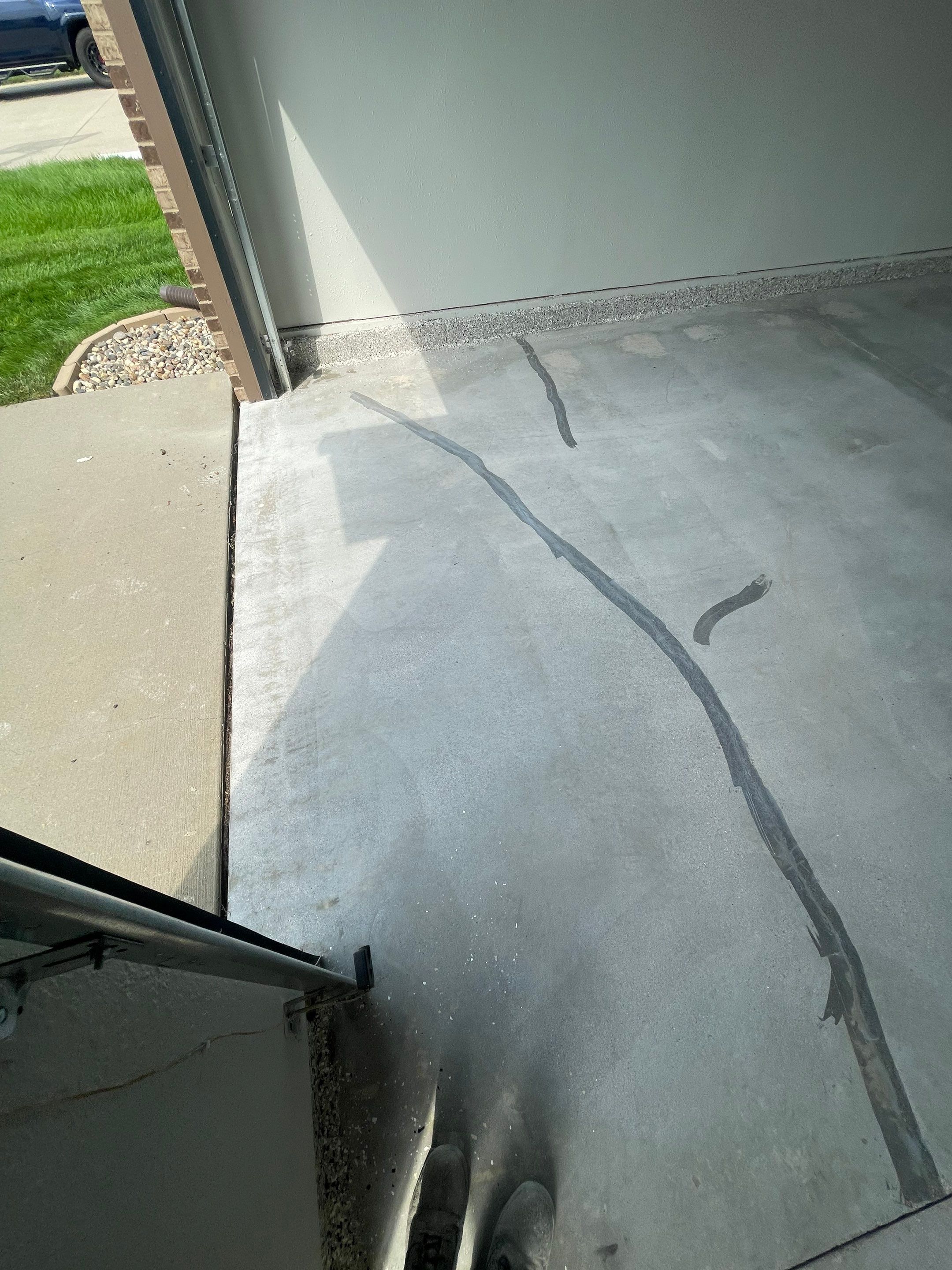 Multi-Car Garage Floor Coating and Crack Repair in Tea by Select Painting, Coatings & Garage Cabinets