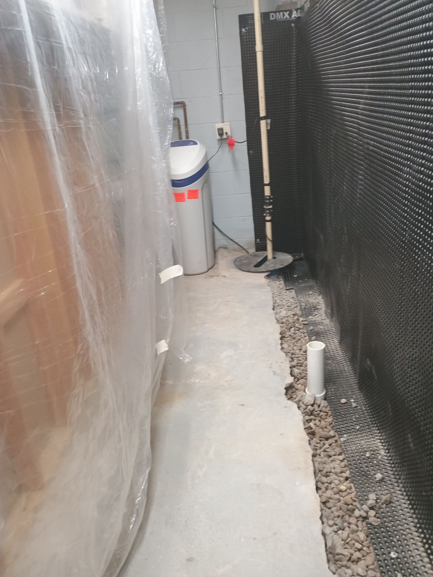 Depressurizing Denny's Basement Wall by Waterproofing Northeast