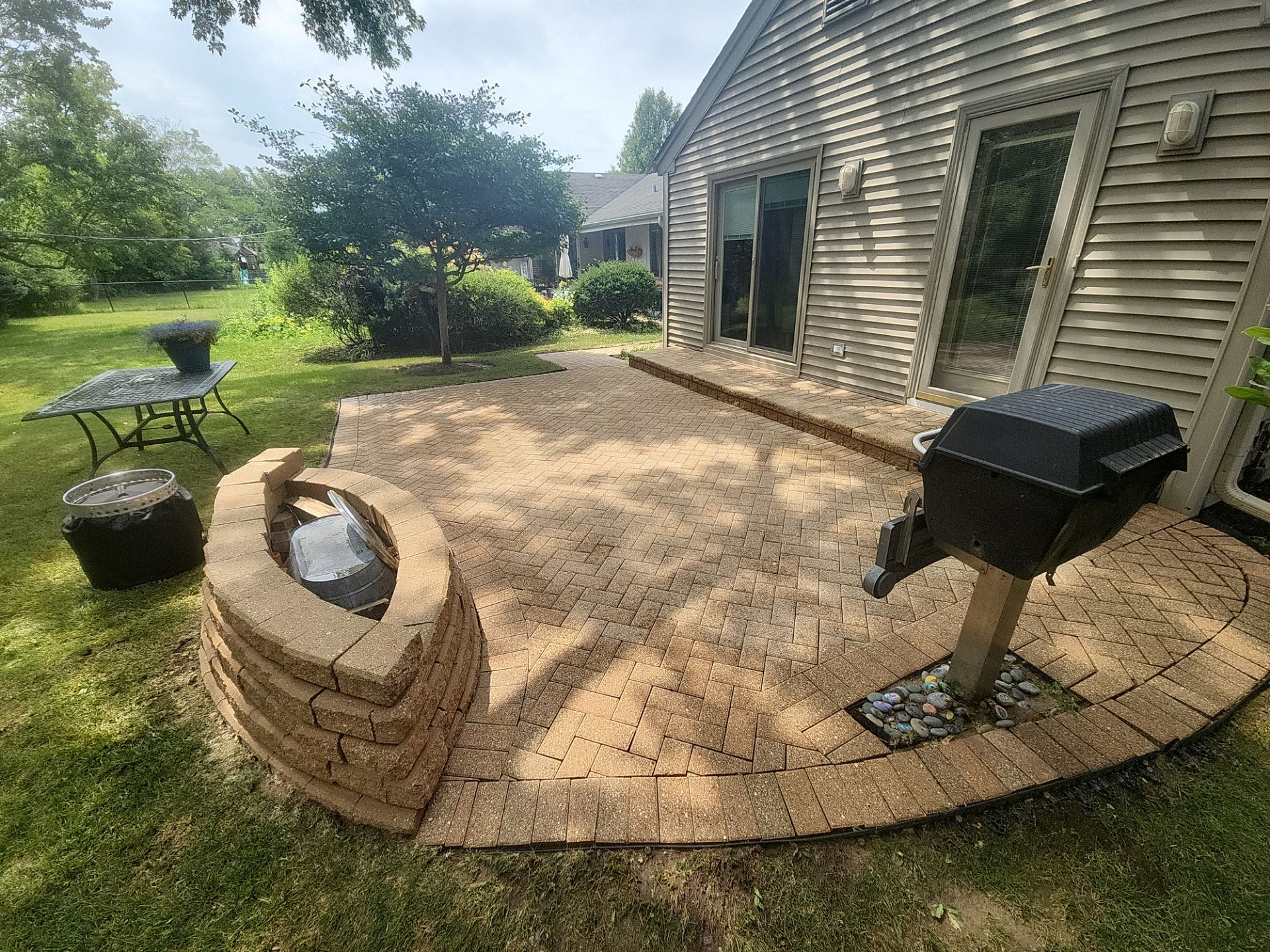 Arlington Heights Brick paver repair, cleaning and sealing by Northern Power Washing LLC.