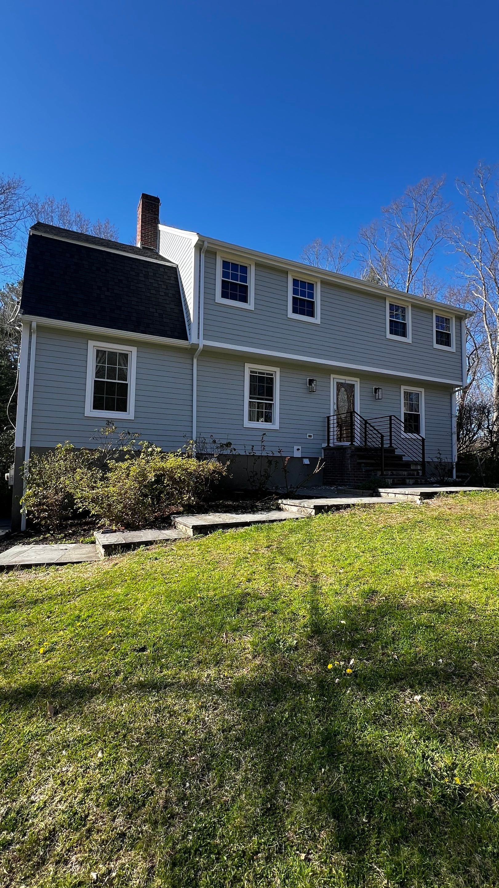 Custom window trim work and siding replacement in Dover, MA by UBrothers Construction