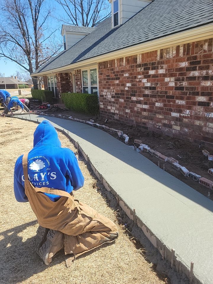 Concrete sidewalk using Concrete by Clays Services Inc
