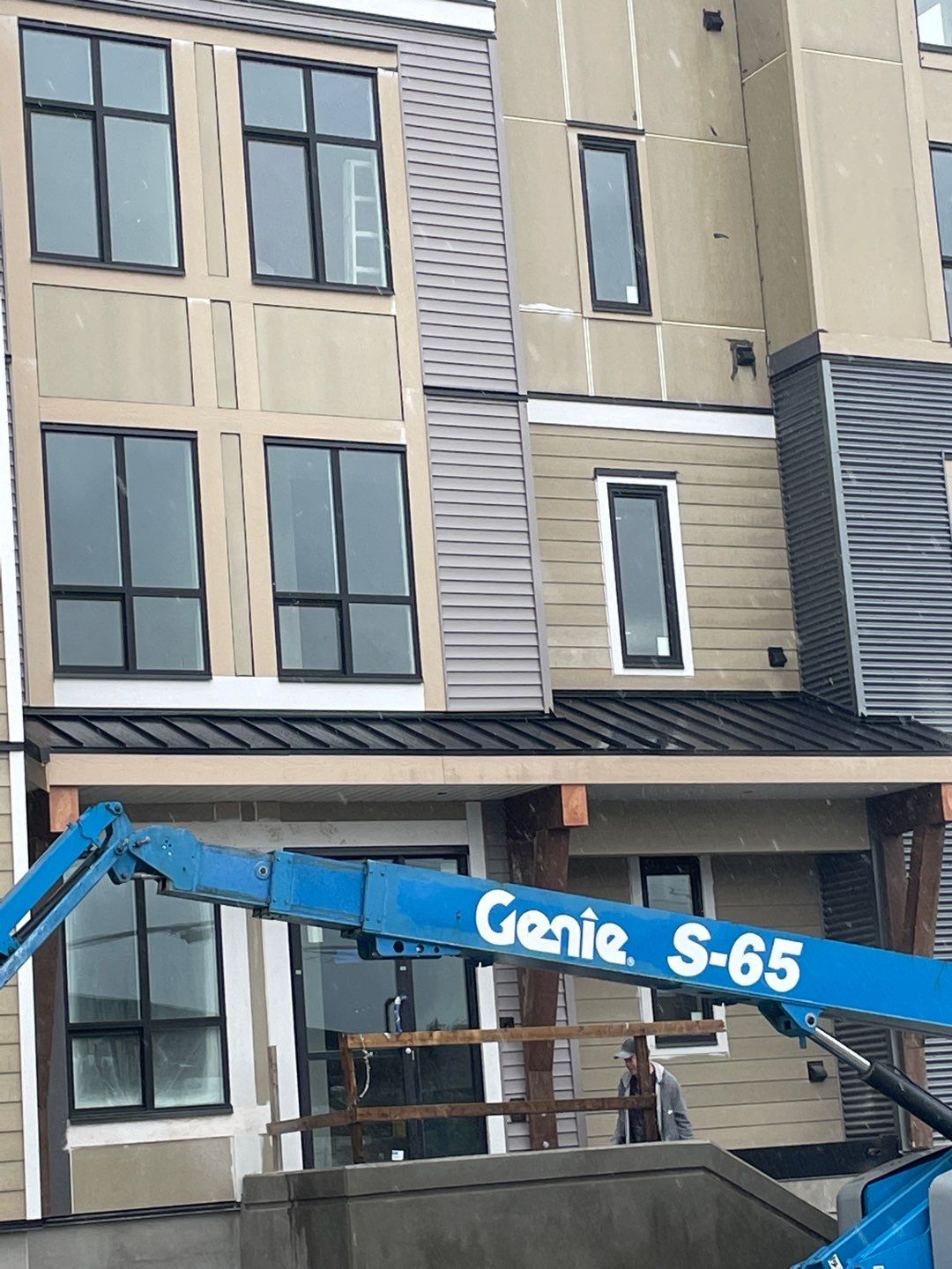 Large apartment with sbs, shingles and prolok metal  by Top Notch Roofing Inc