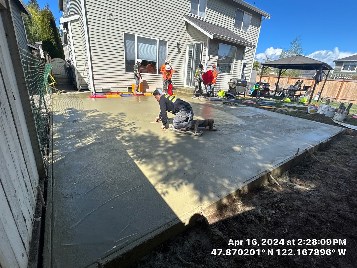 Benedict | Stamped Concrete Back Patio by Jireh Asphalt & Concrete Inc 