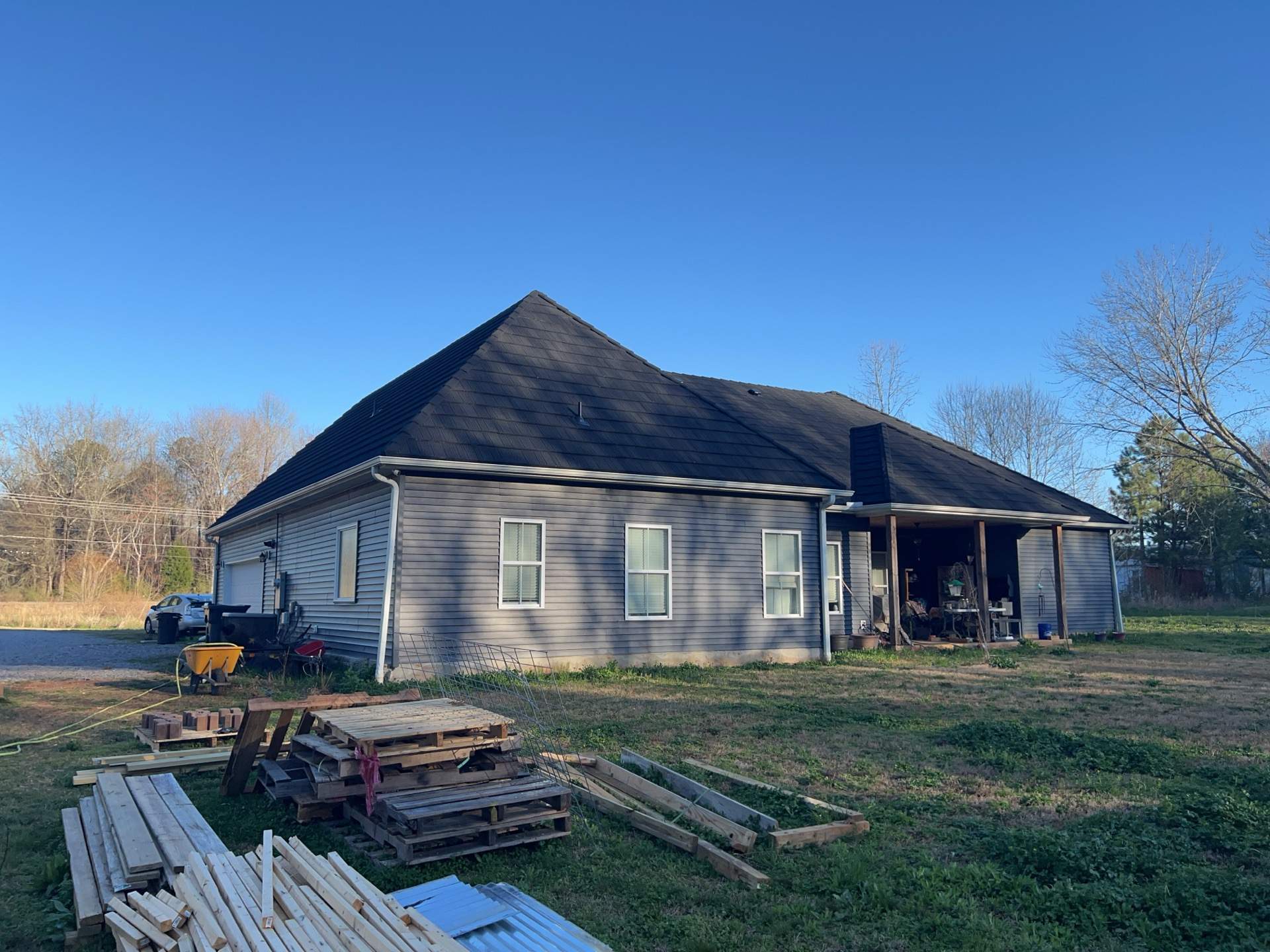 Siding Replacement using James Hardie Countrylane Red by Freedom Exteriors
