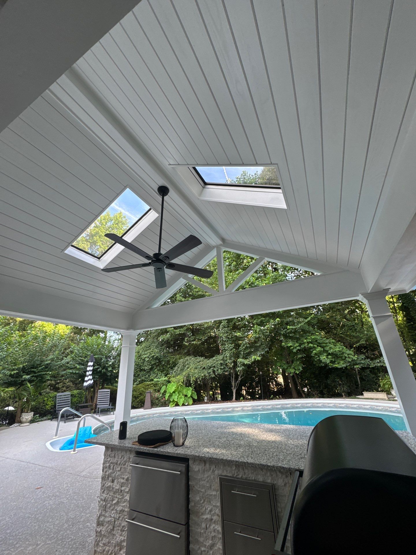 Marietta Poolside Pavilion with Custom Outdoor Kitchen and Pergola by Swift Home Renovations