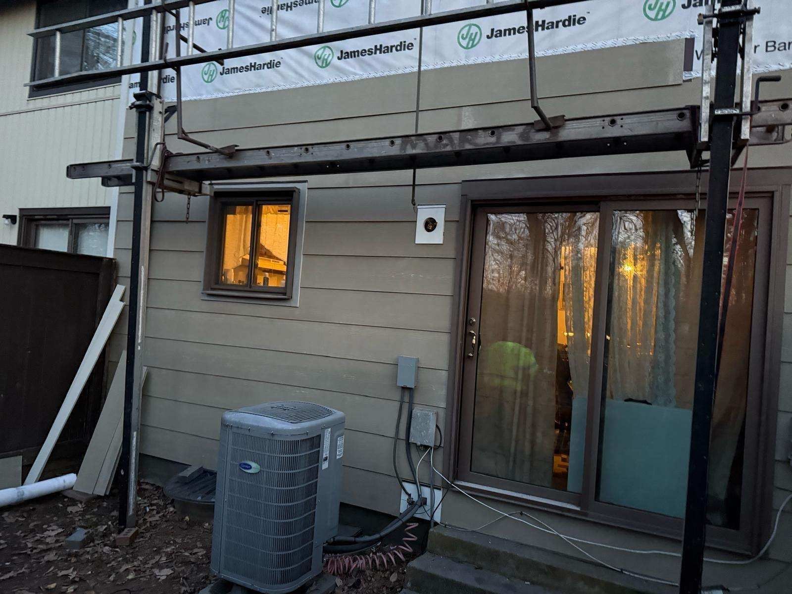 Reston: Residential Siding Replacement with James Hardie Statement Beaded Plank in Cappuccino Muffin by RM Banning, Inc.