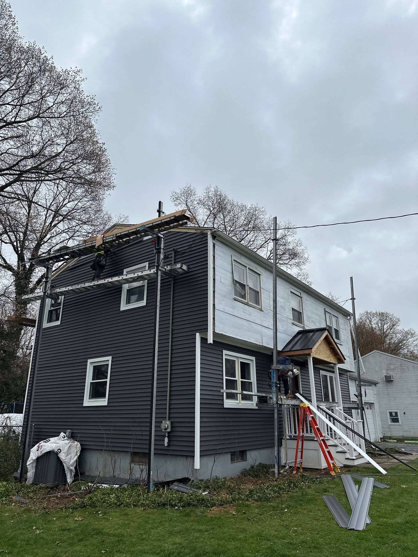 Siding Installation using Royal Building Products Carbon by A Plus Exterior
