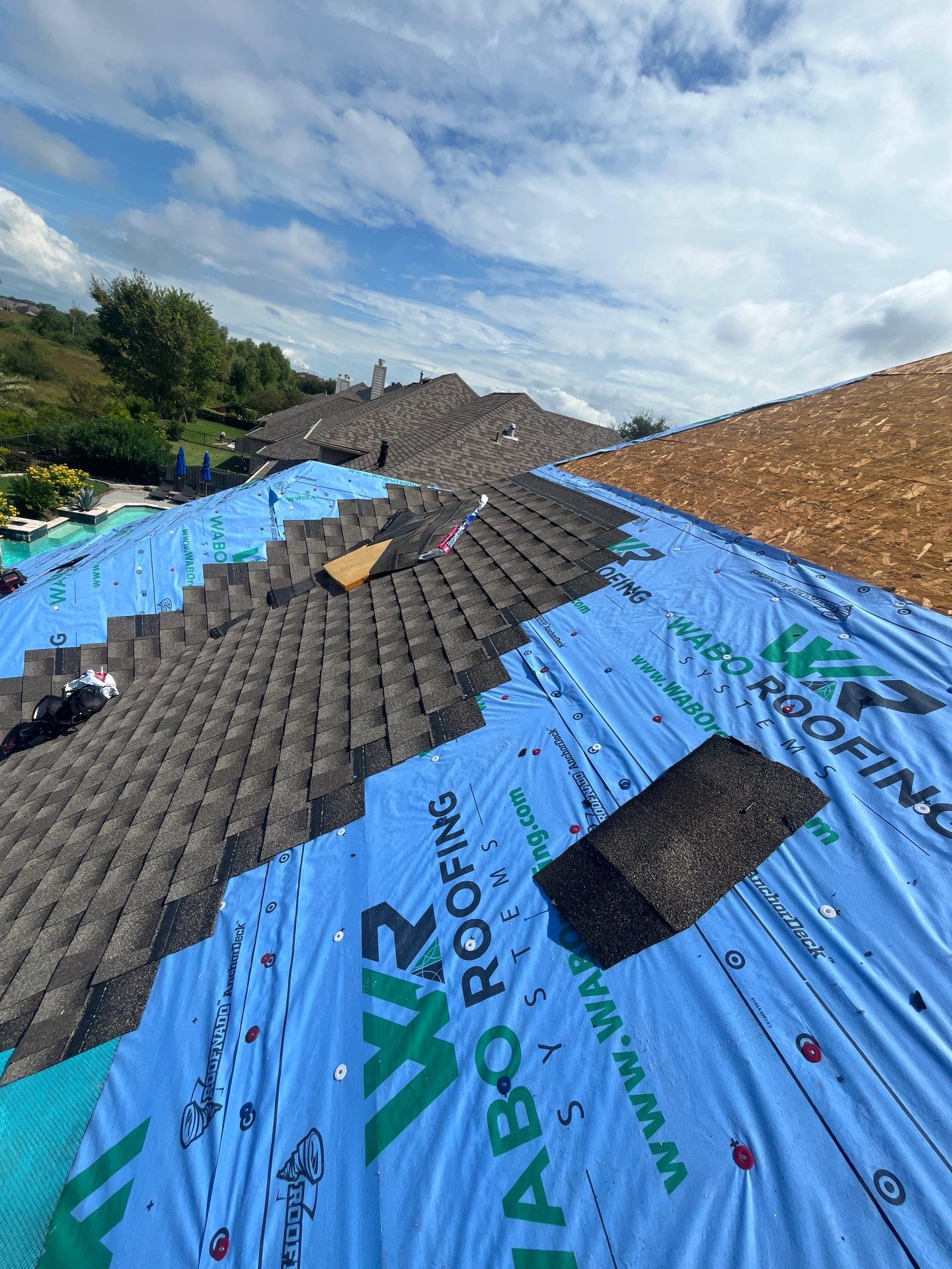 Residential Roofing Installation using GAF Timberline HDZ (weathered wood) by WABO Roofing Systems 