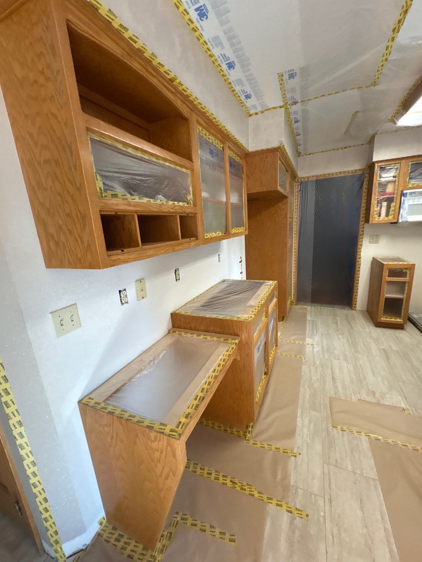 Kitchen Cabinet Painting and Hardware Update in Sioux Falls by Select Painting, Coatings & Garage Cabinets