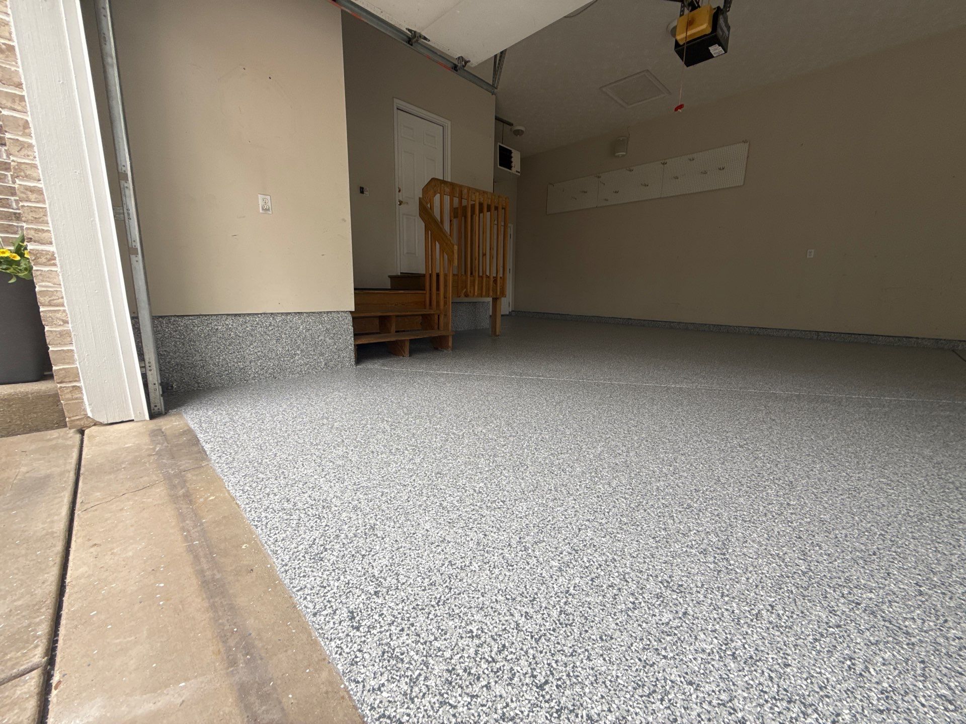Gravel Garage Floor Coating by Level 10 Coatings