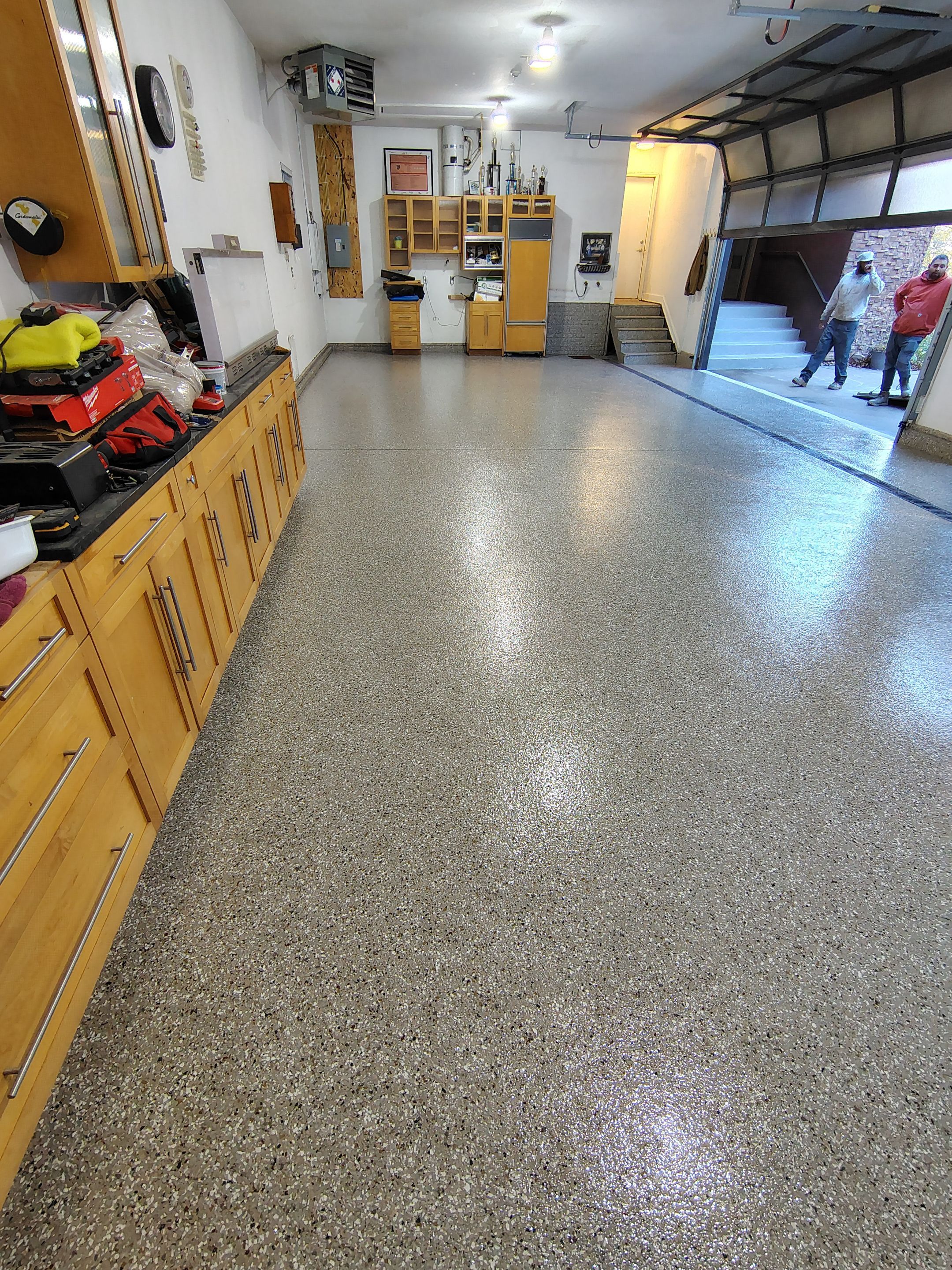 Garage Floor and Entry Step Concrete Coating in Sioux Falls by Select Painting, Coatings & Garage Cabinets