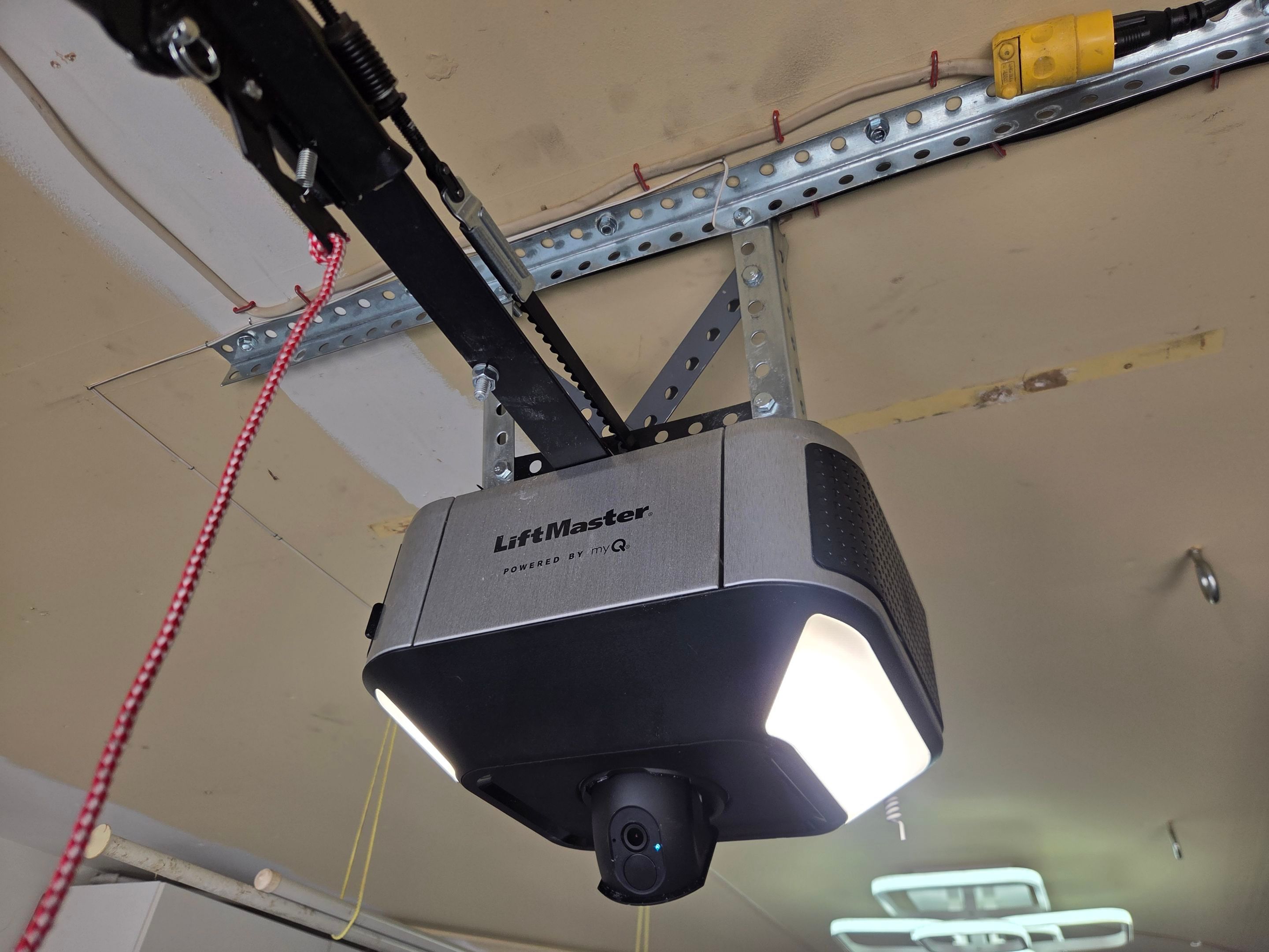 Wood-Grain Sectional Garage Door and LiftMaster Smart Opener Installation in Pleasanton by Valiant Garage Door