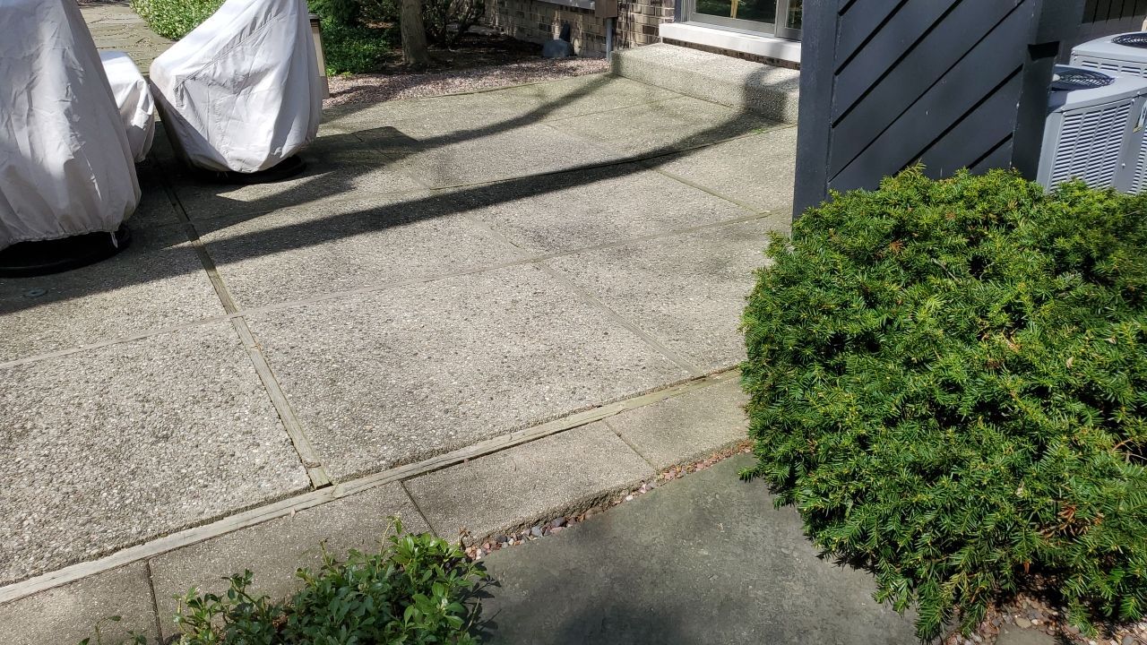 Aggregate concrete cleaning and sealing using Surebond SB-9000 by Northern Power Washing LLC.