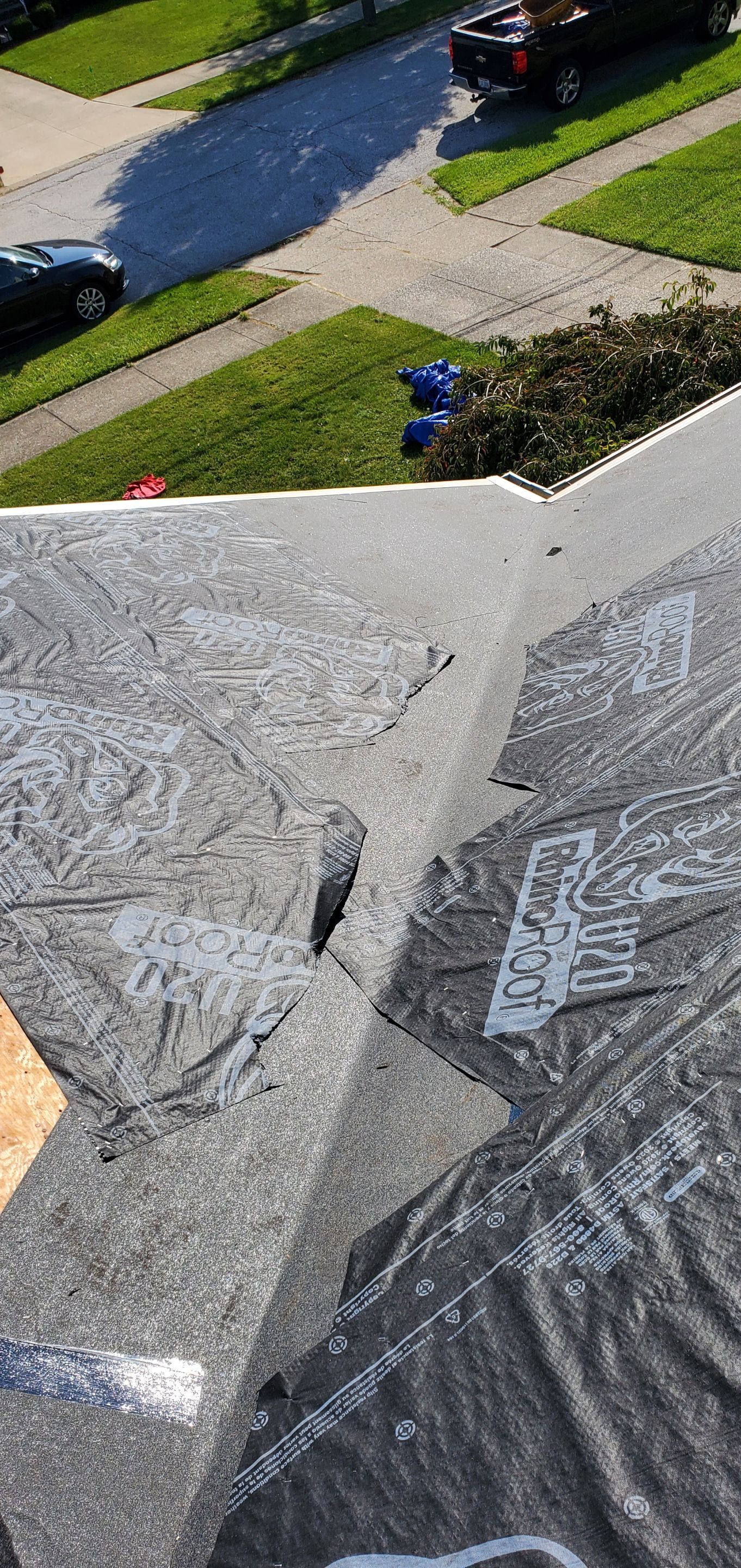 Residential Roofing Installation by Absolute Roofing and Construction