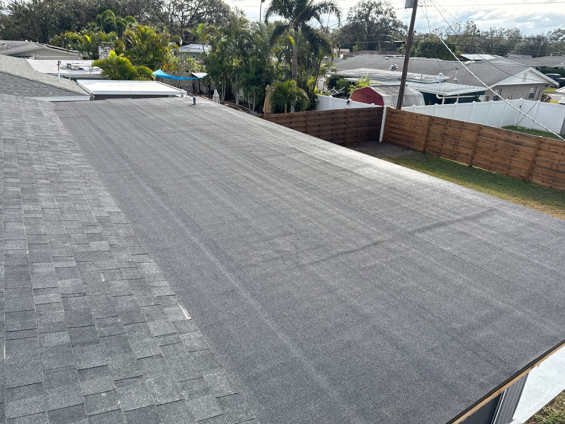 Onyx Black Shingles by Reimagine Roofing