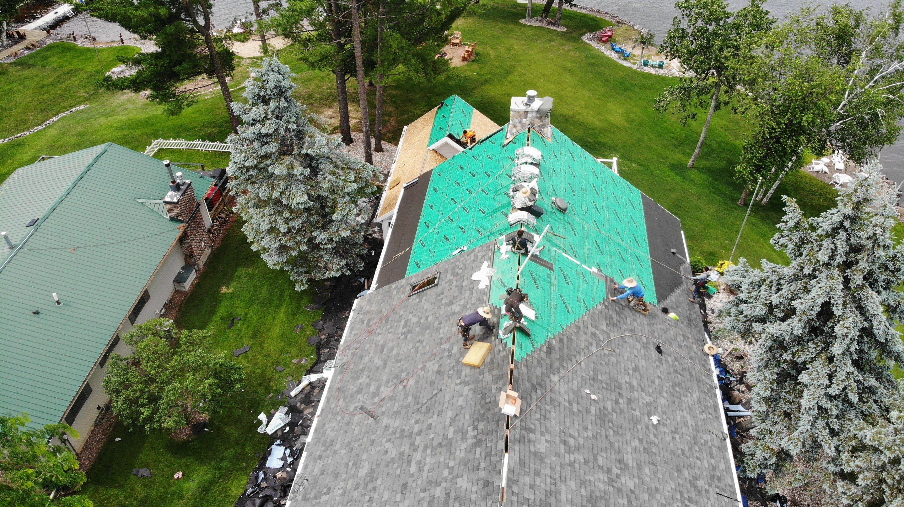 Nekoosa Residential Roof Replacement with Architectural Shingles and Skylights by Mr Roof & Remodeling Co
