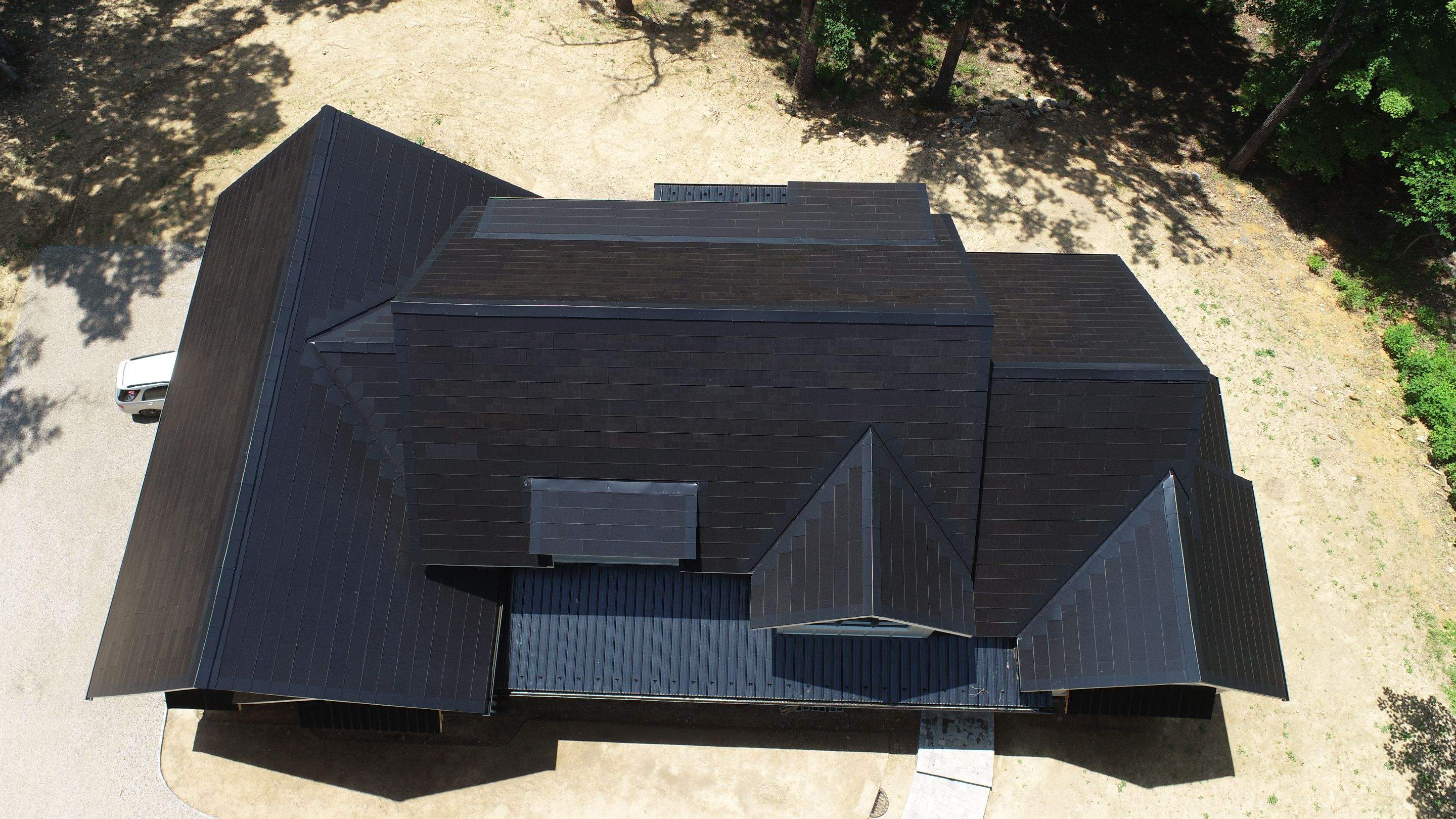 New Construction with Tesla Solar Roof + Powerwall by American Home Contractors