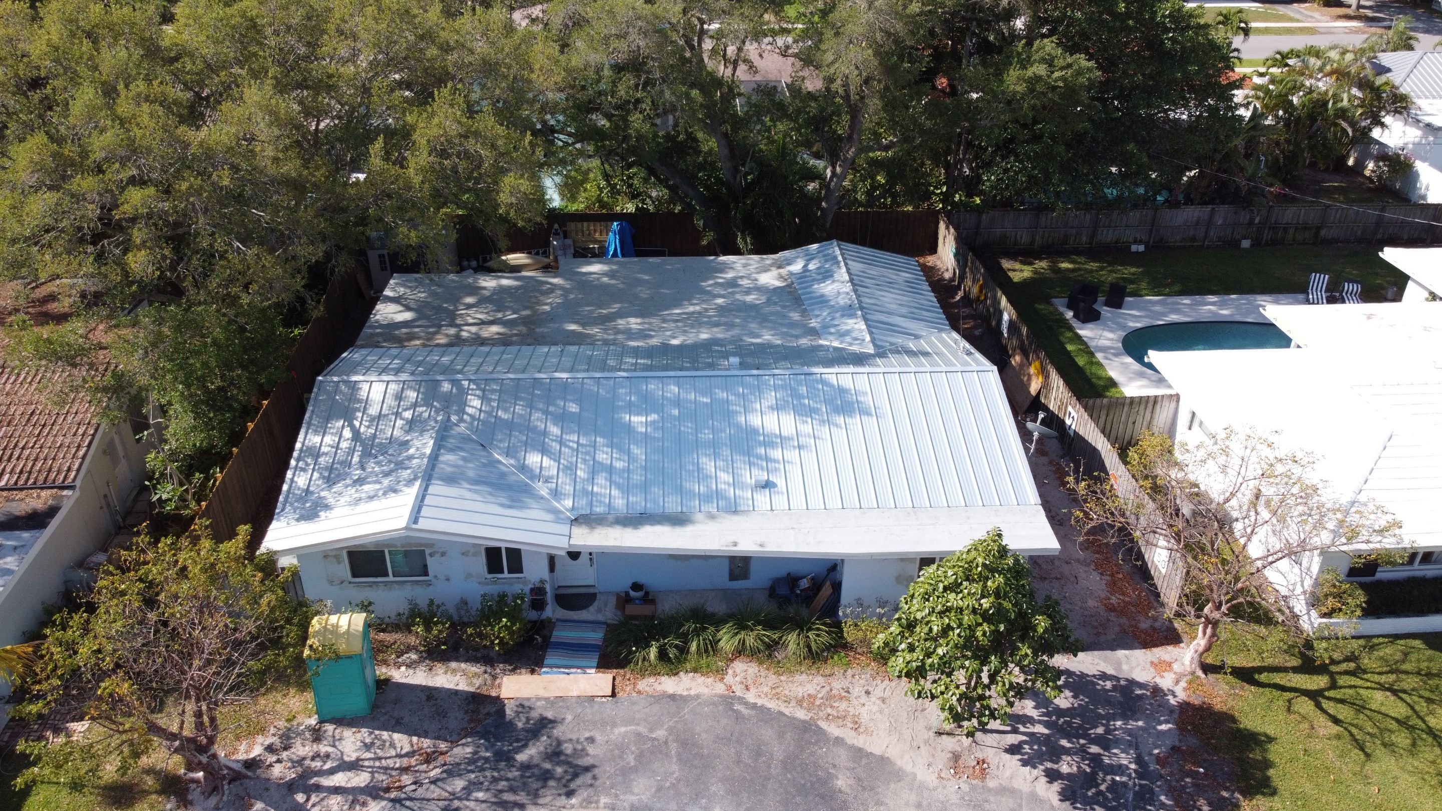 Residential Roofing Installation using 1.5'' Mechanical Seam by BLUES BROTHERS ROOFING