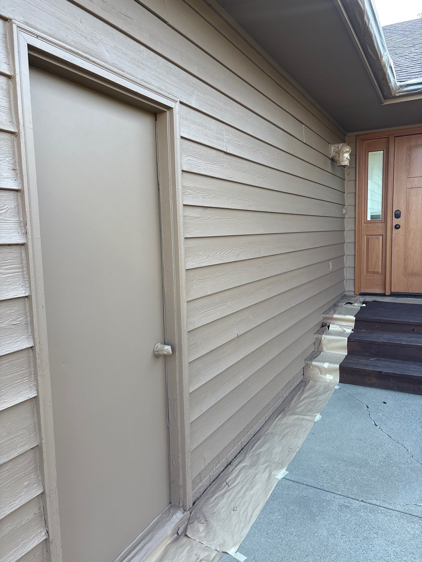 Wood Siding Restoration and Exterior Painting in Sioux Falls by Select Painting, Coatings & Garage Cabinets