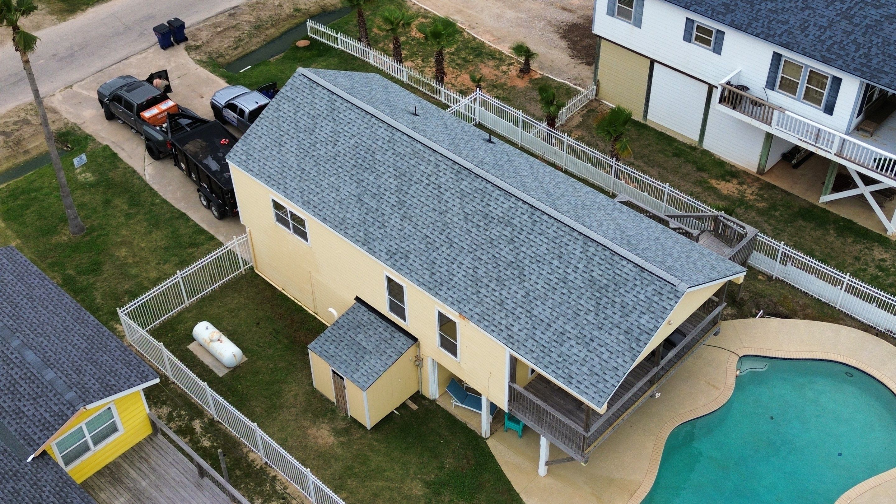 Roof Replacement using IKO Cambridge Dual Grey by CAP Roofing and Construction LLC