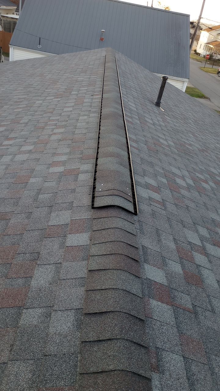 Commercial Roofing Installation using Performance Shingles by Mr. Roofer