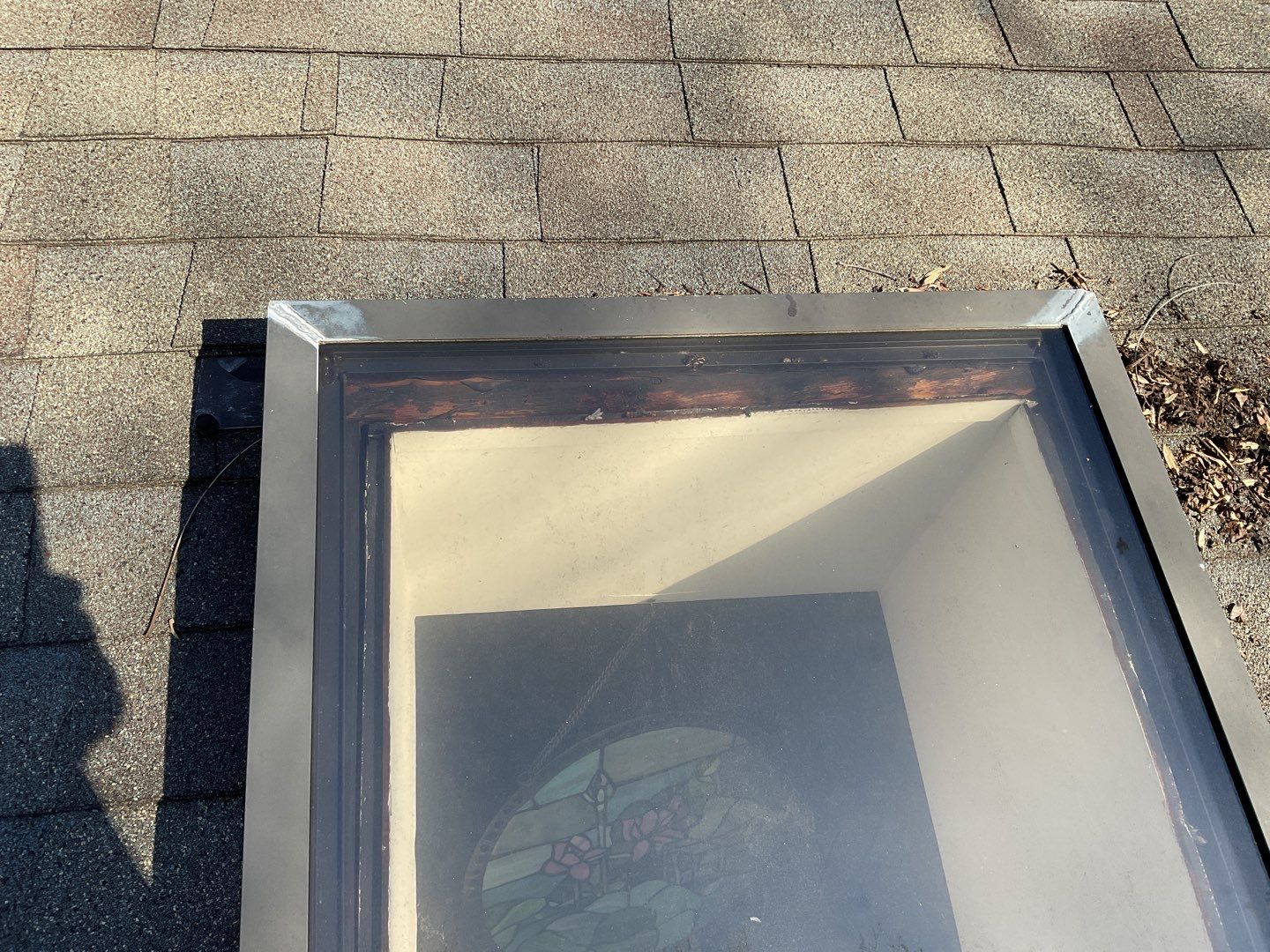 Install new shingles and new skylights  by Alpha Design Services