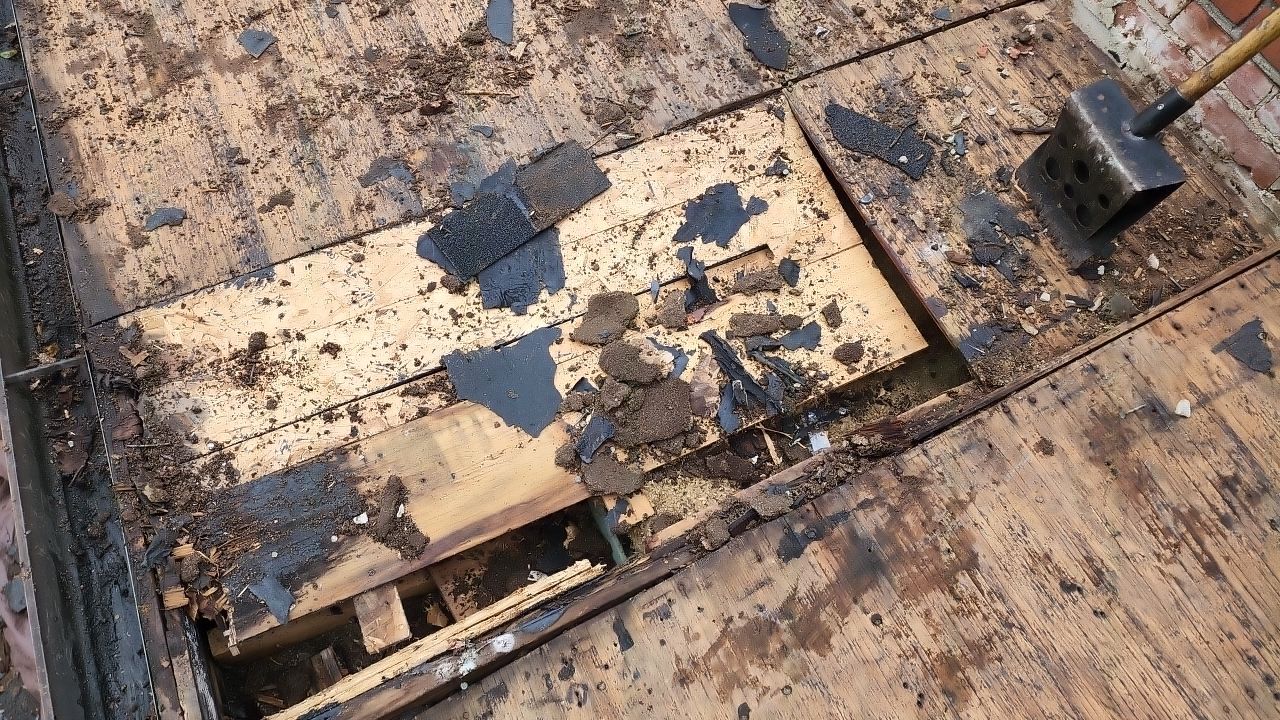 Residential Roofing Installation using 60 mil rubber roof  by Nitro Roofing and Construction
