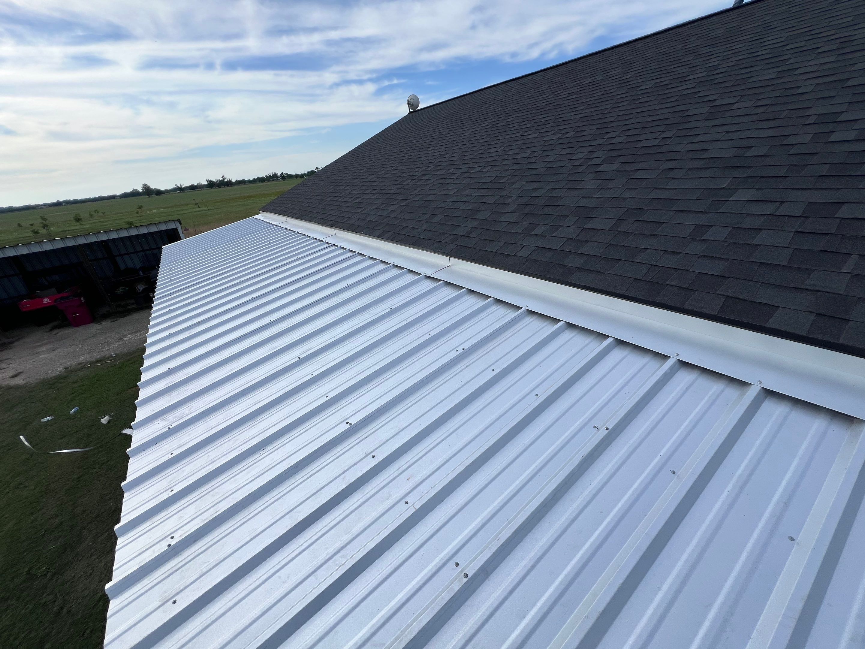 Residential Roofing Installation using Metal by Roof Repair Company