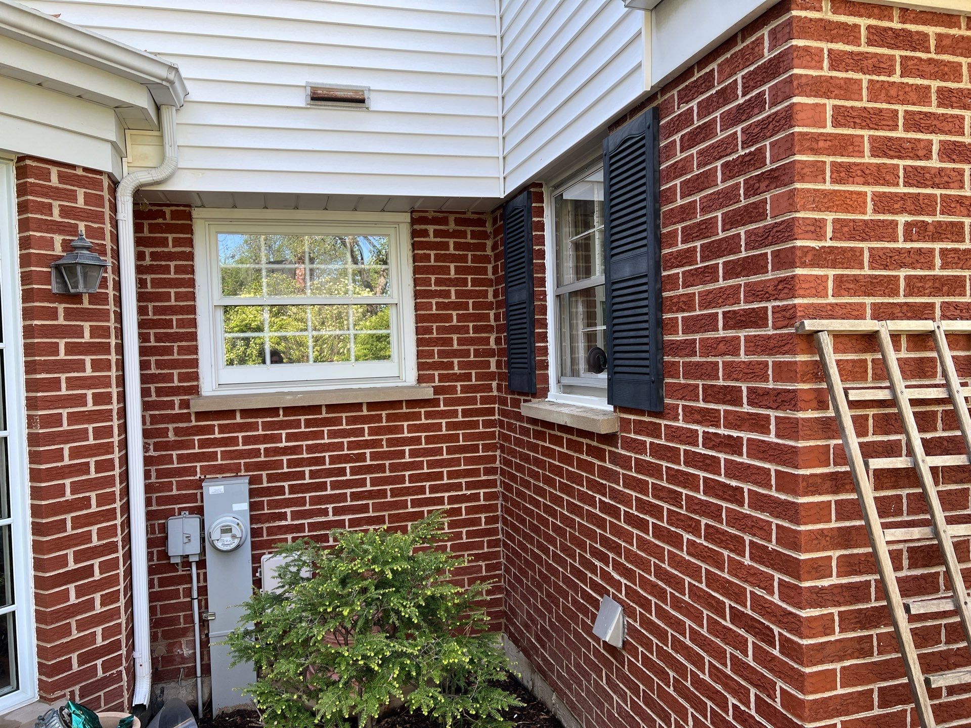 Housewashing  using Algaecide, soft wash soap by Northern Power Washing LLC.