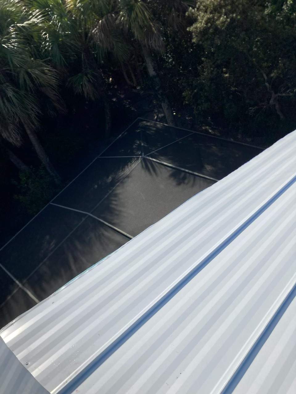 Residential Roofing Installation using Gulf Coast Metals Gulf Seam Panels by Four Peaks Roofing