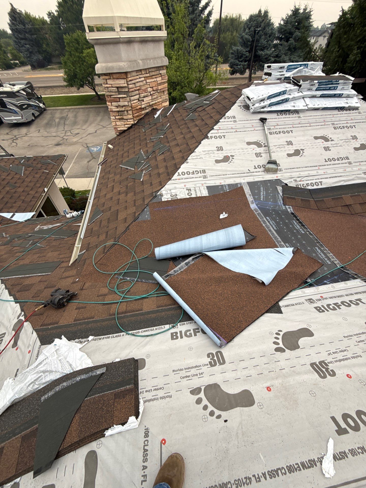 Boise Commercial Roof Replacement with Brown Architectural Shingles by Olive Roofing