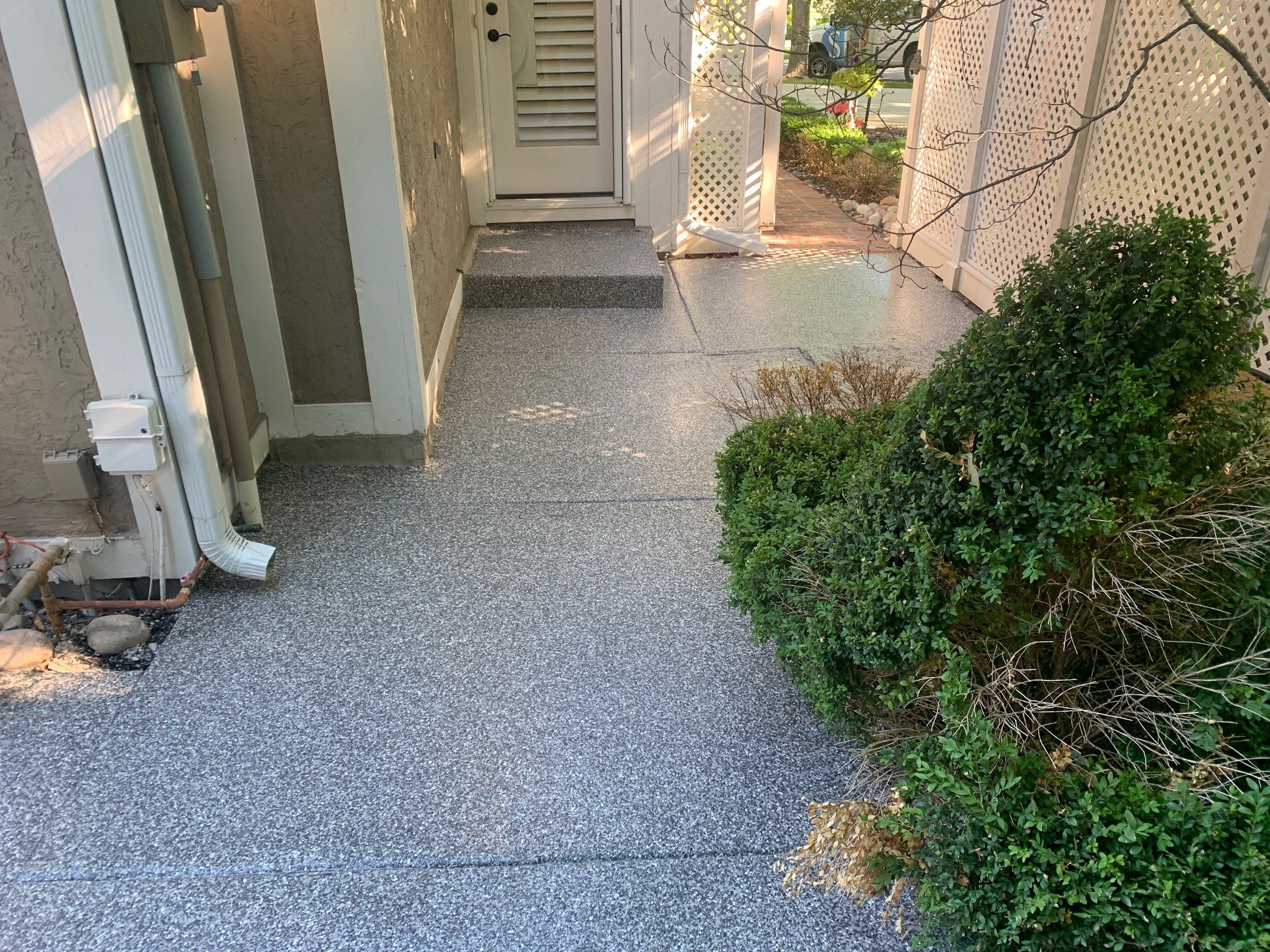 Patio using Domino  by Select Painting, Coatings & Garage Cabinets