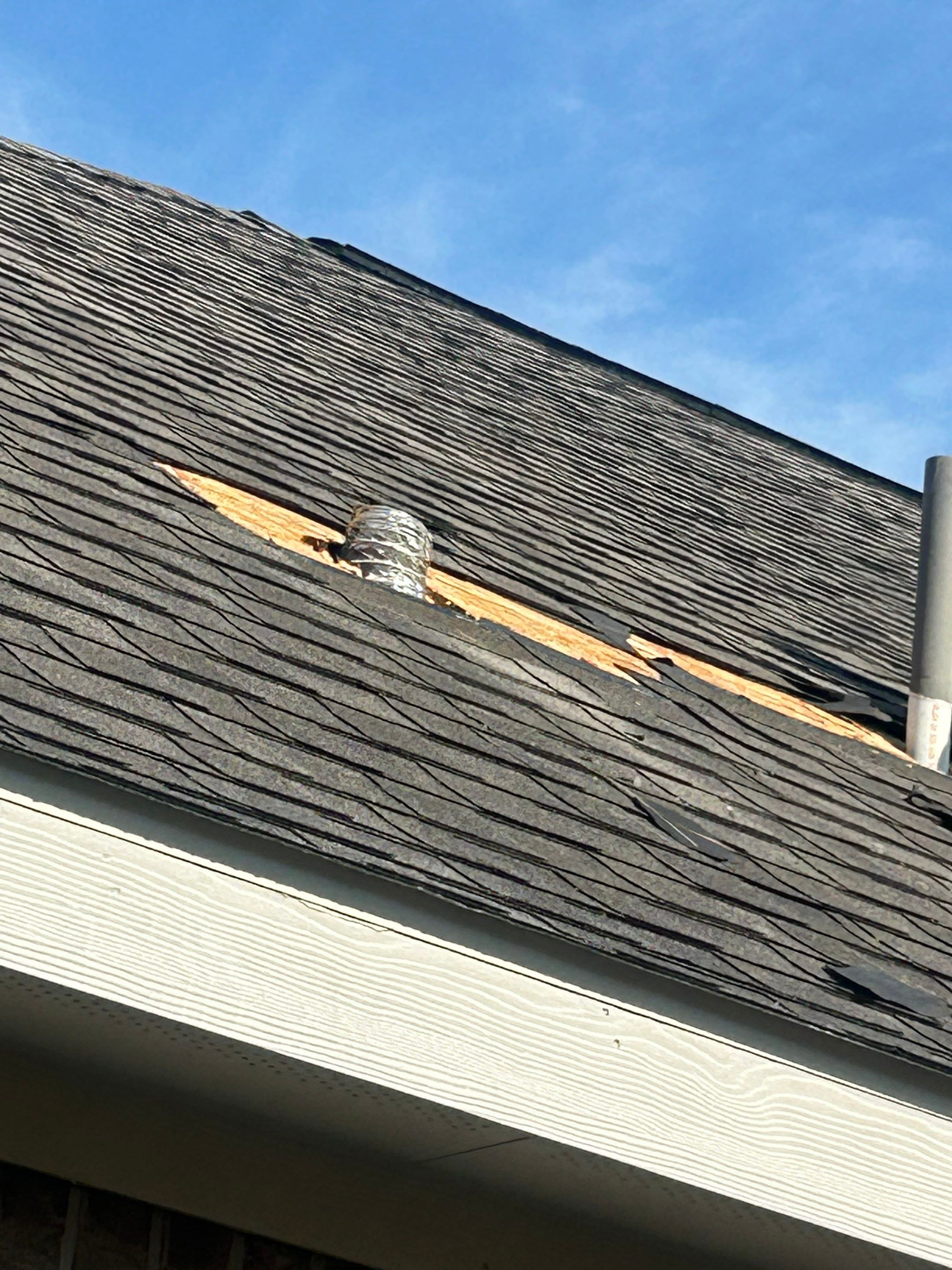 Hail Damage using Owen's Corning Duration (Lifetime) Shingles by Roof Repair Company