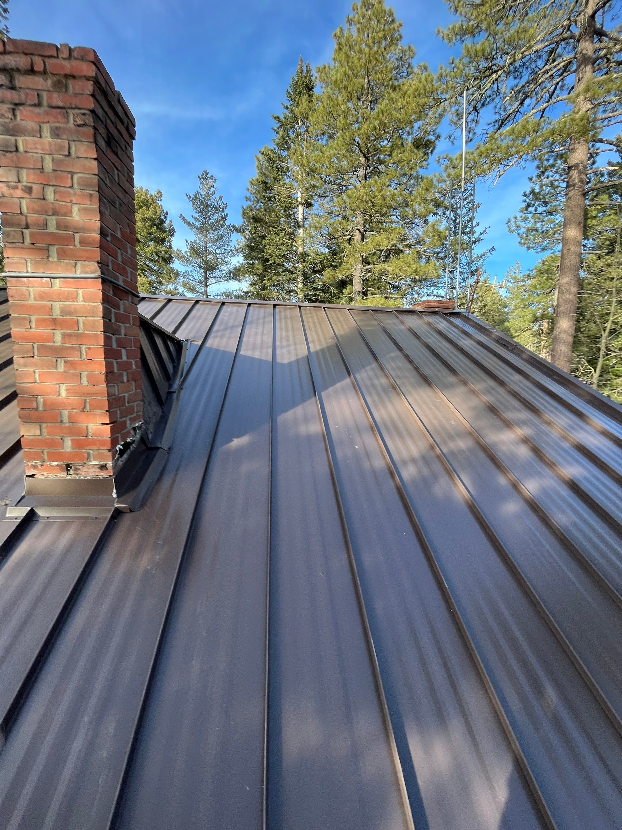 Burnished Slate Standing Seam by Reimagine Roofing