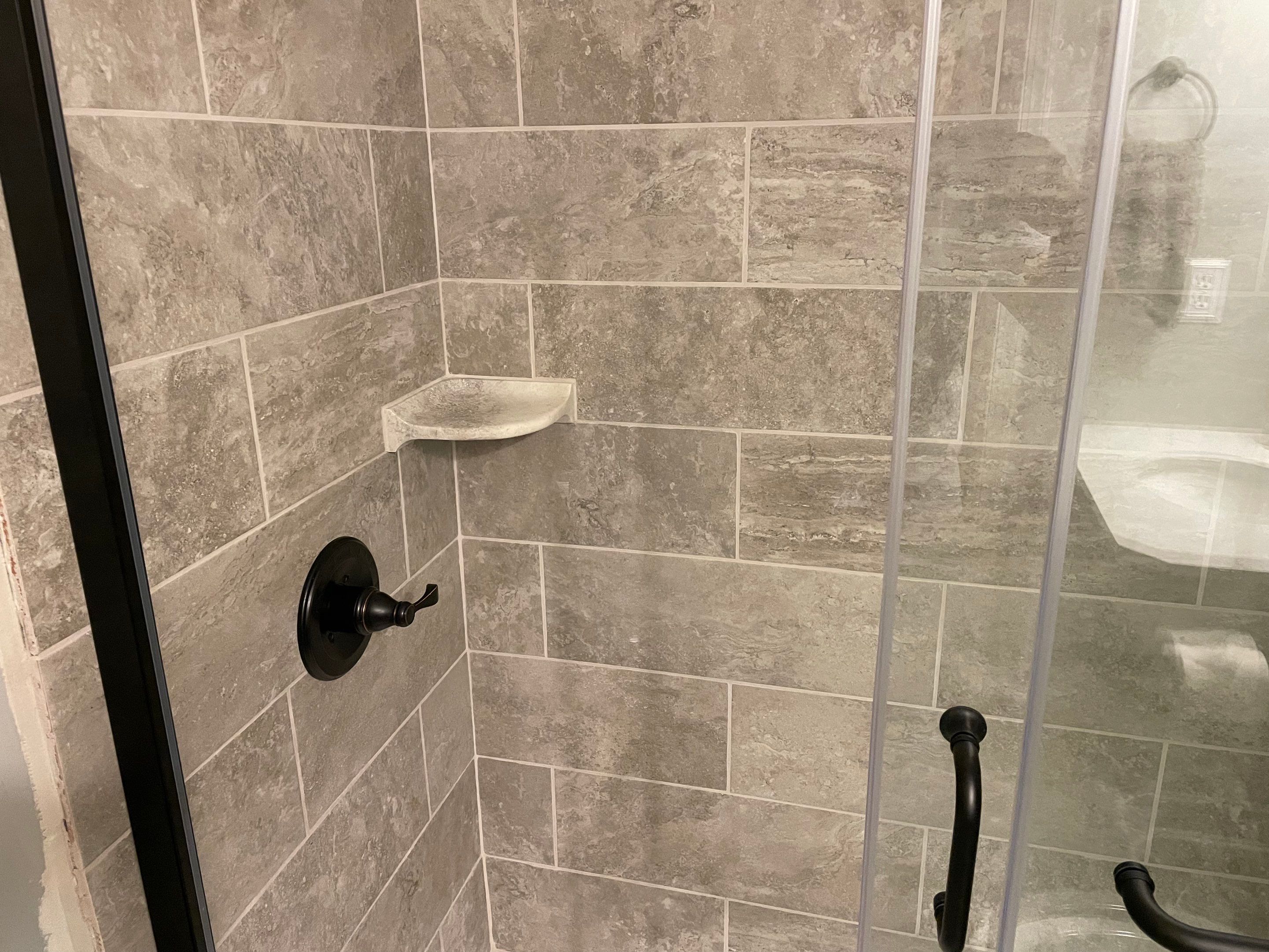 Bathroom Remodel using Tile by Home Concepts Construction