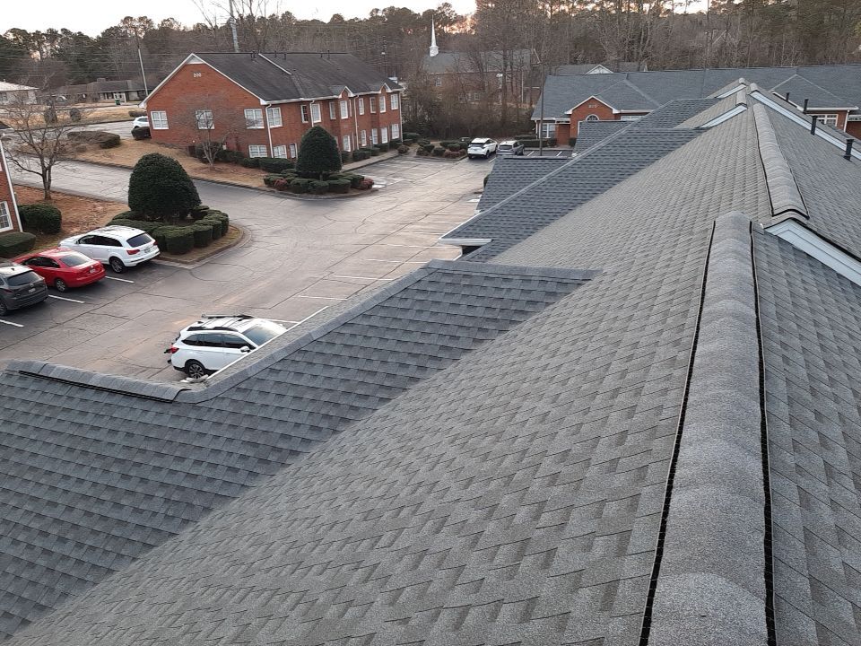 Weekend install for this commercial building to eliminate disruption to the businesses by Georgia Roof Advisors