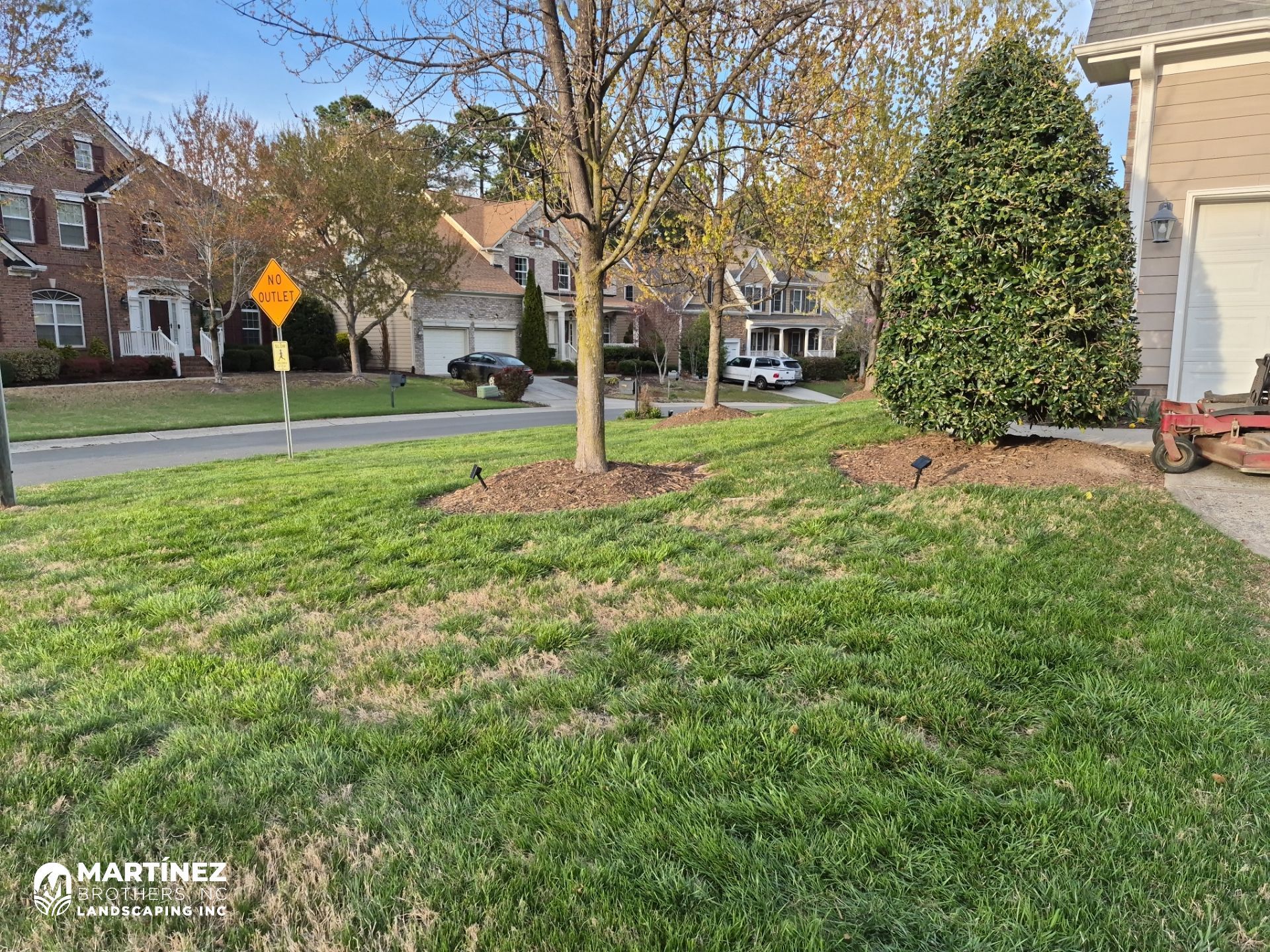 Fixing brown spots in grass in Durham by Martinez Brother’s Nc Landscaping Inc